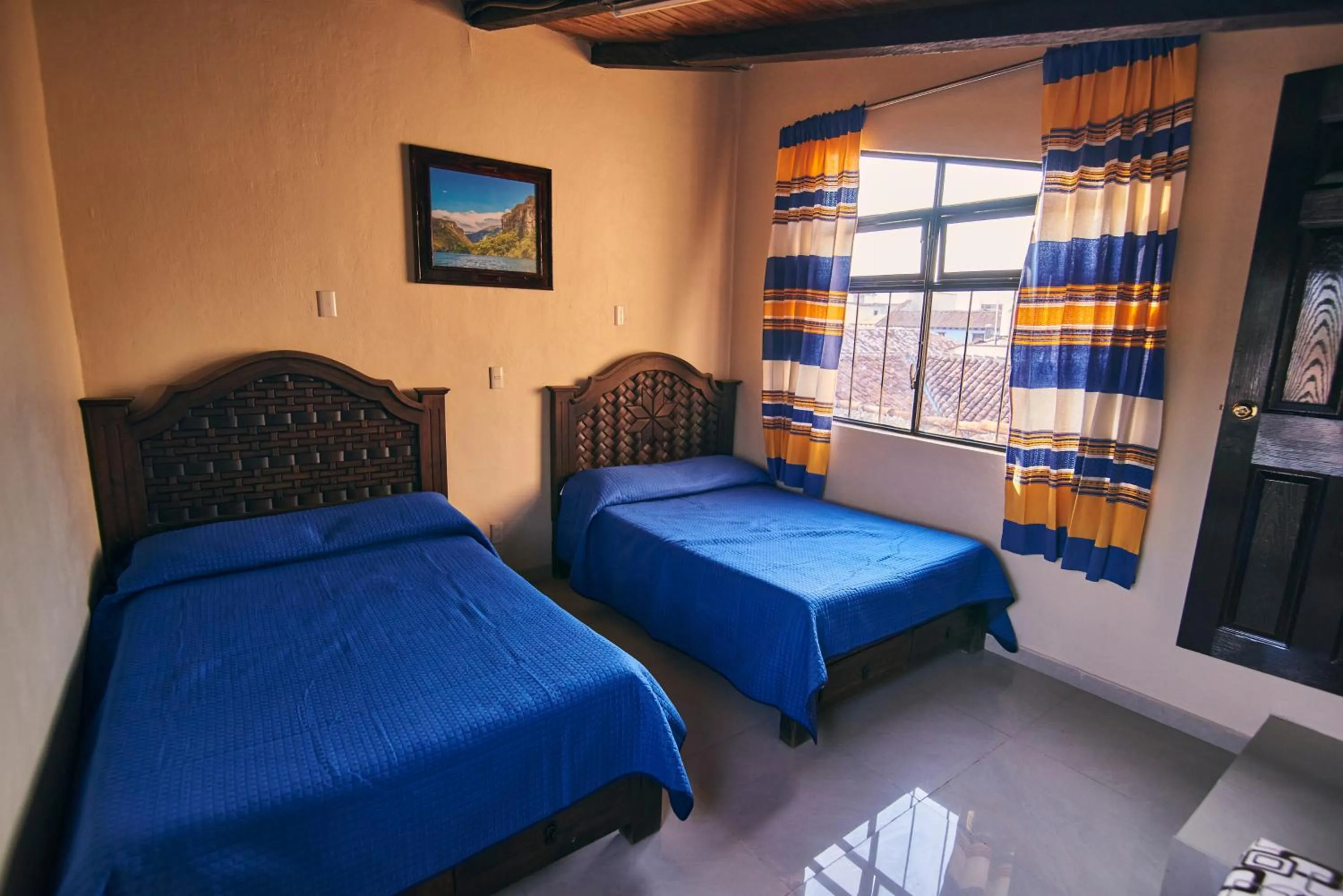 Bed in Hotel Palacio de Moctezuma