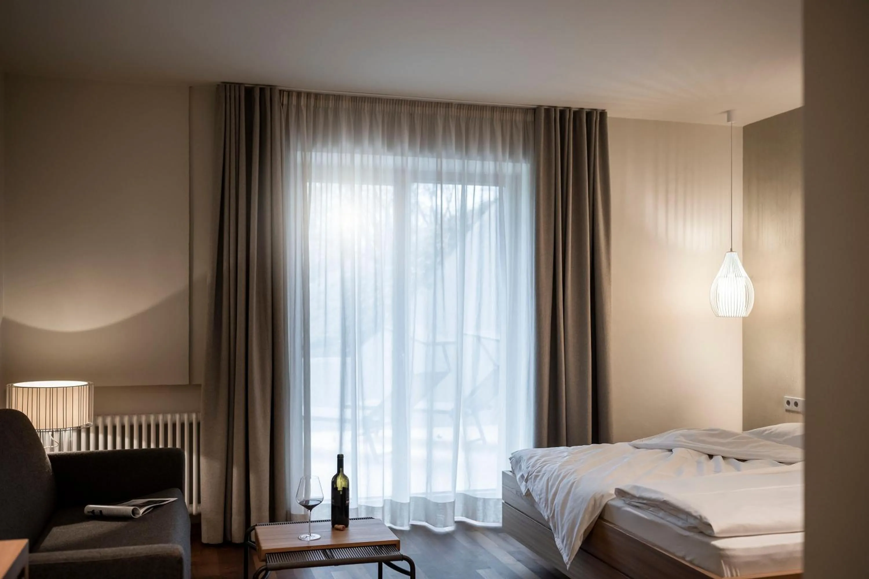 Bed in Hotel Weingut Stroblhof