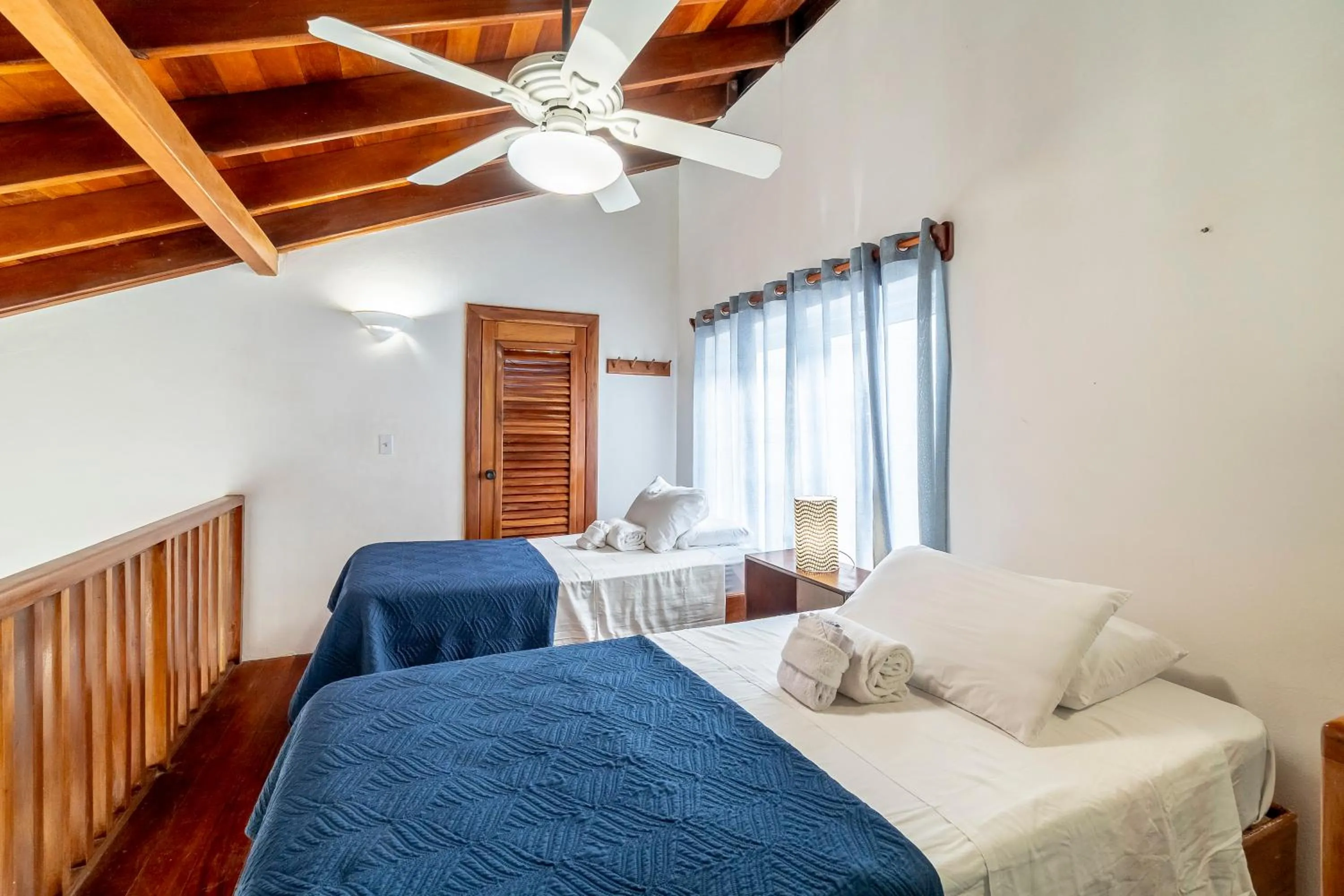 Bed in Caribbean Villas Hotel