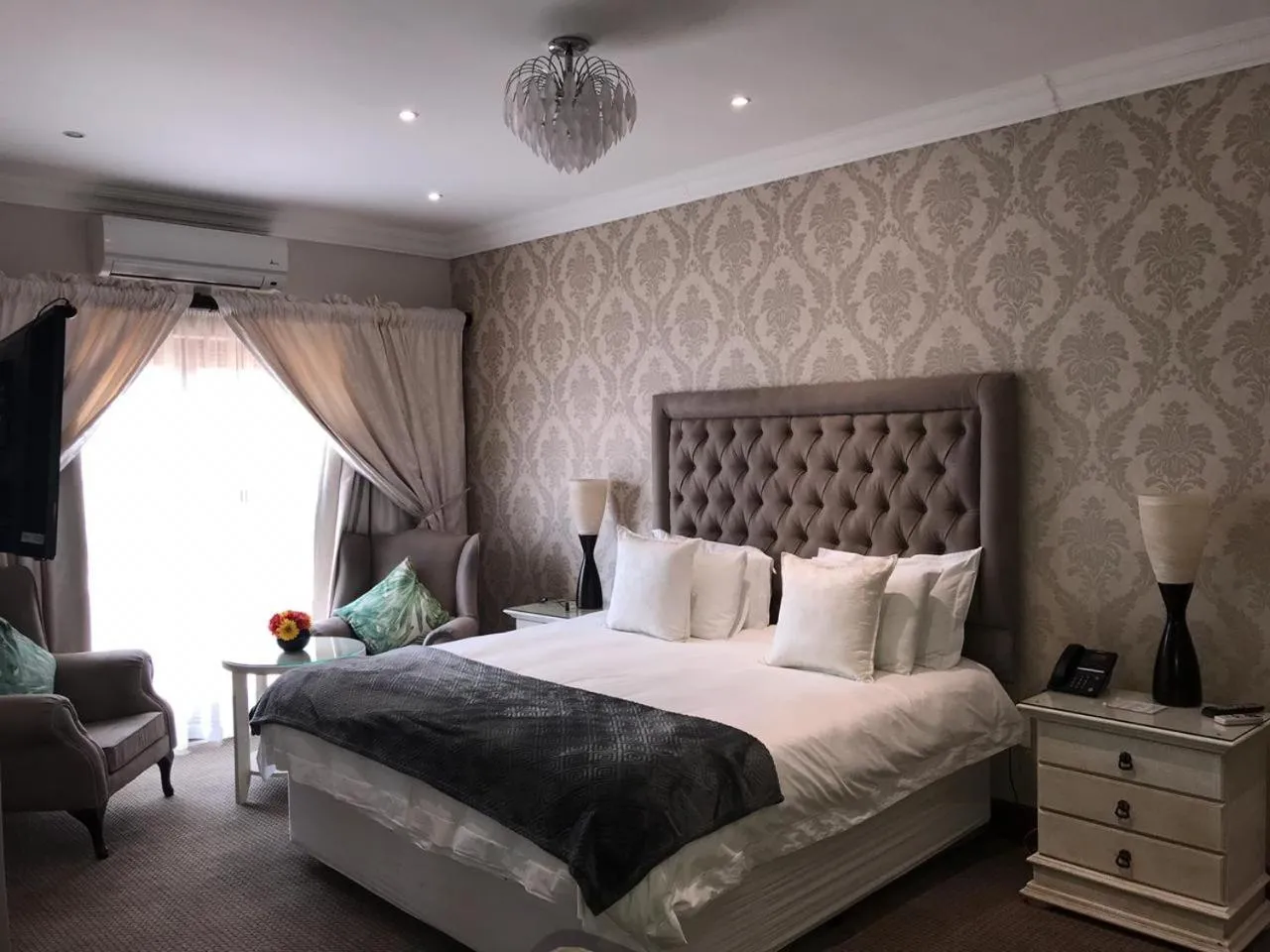 Bed in Classique Grace Boutique Hotel