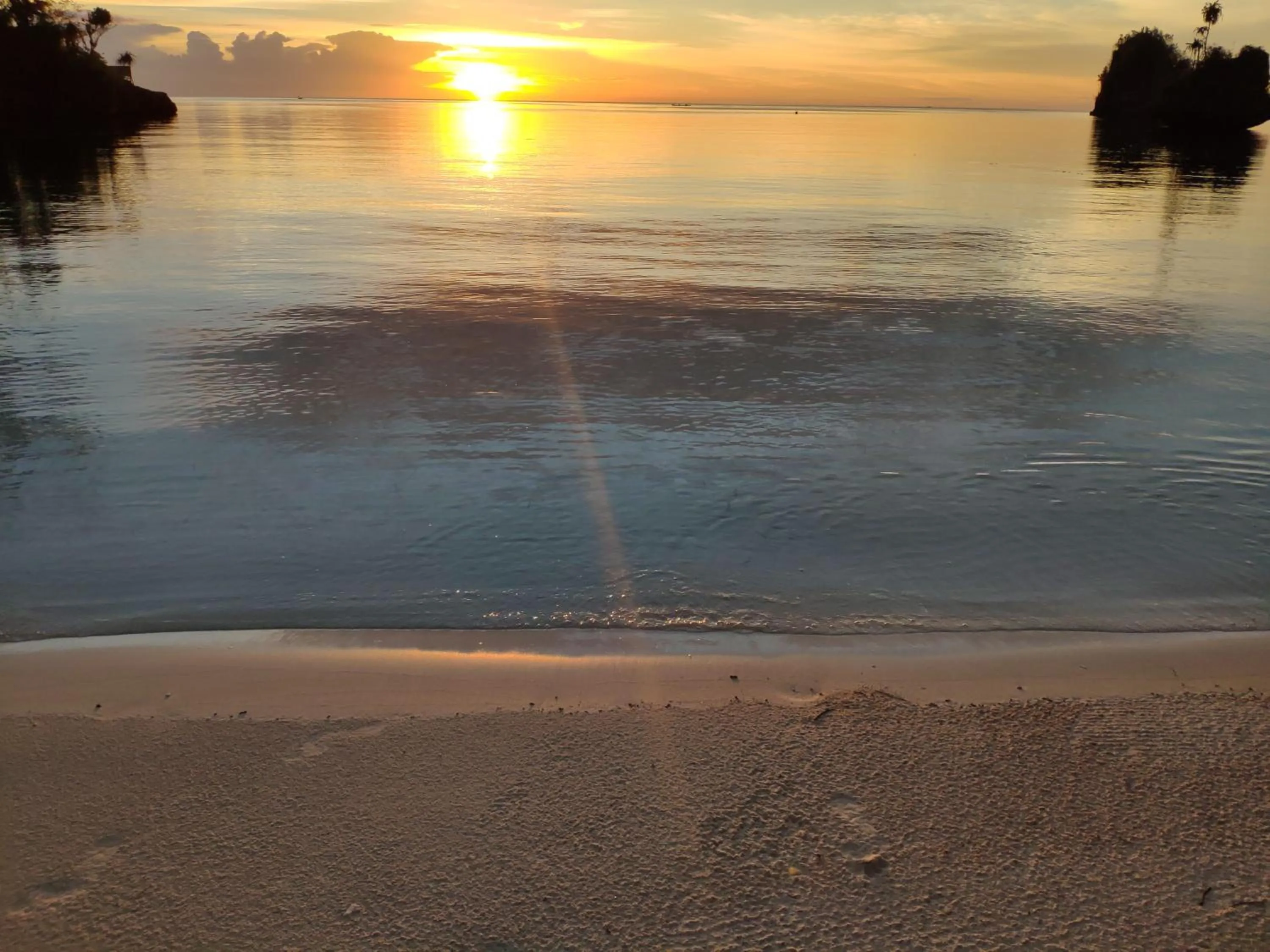 Beach in Harmony Bay Resort and Dive Center