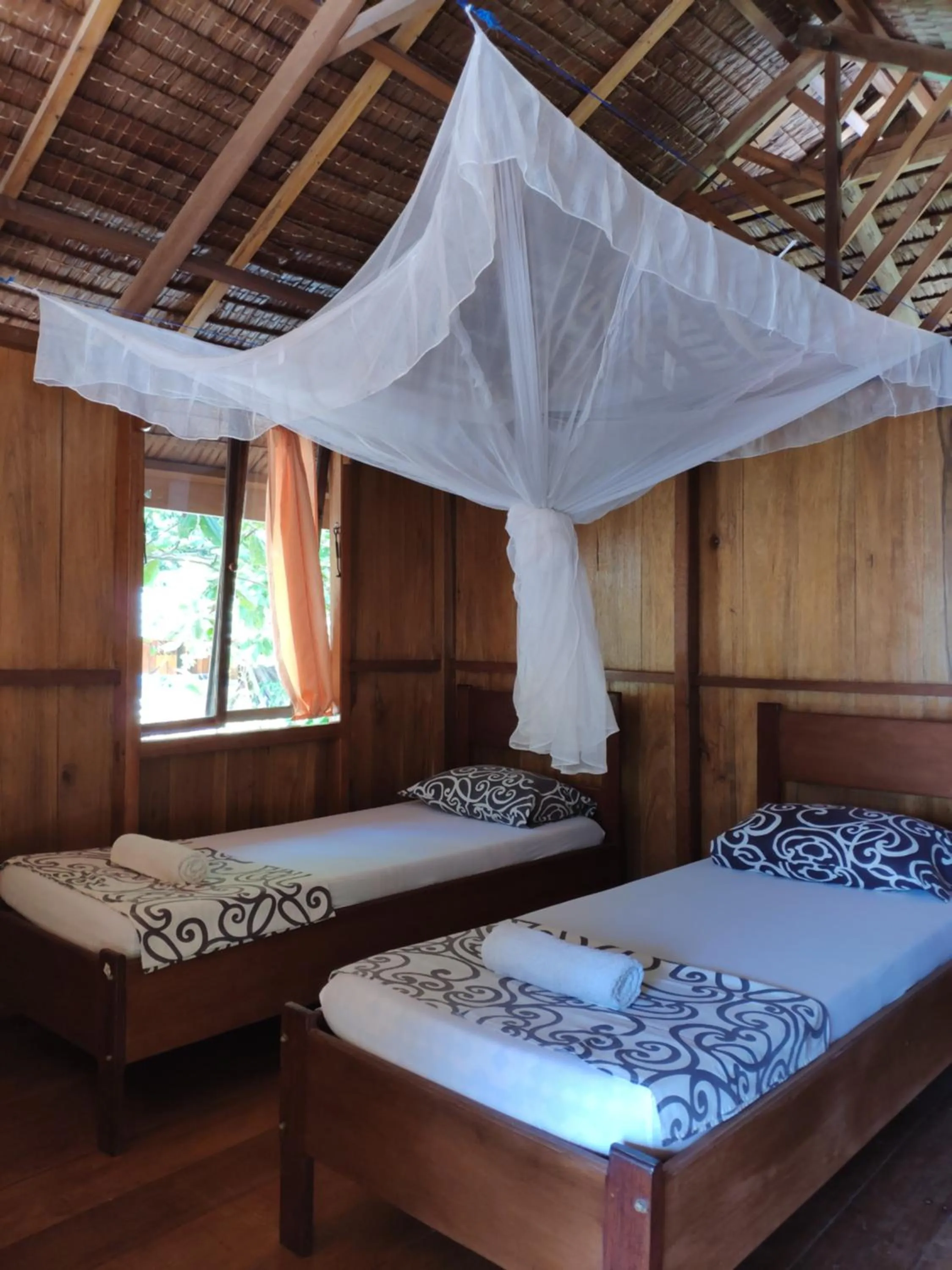 Bedroom, Bed in Harmony Bay Resort and Dive Center