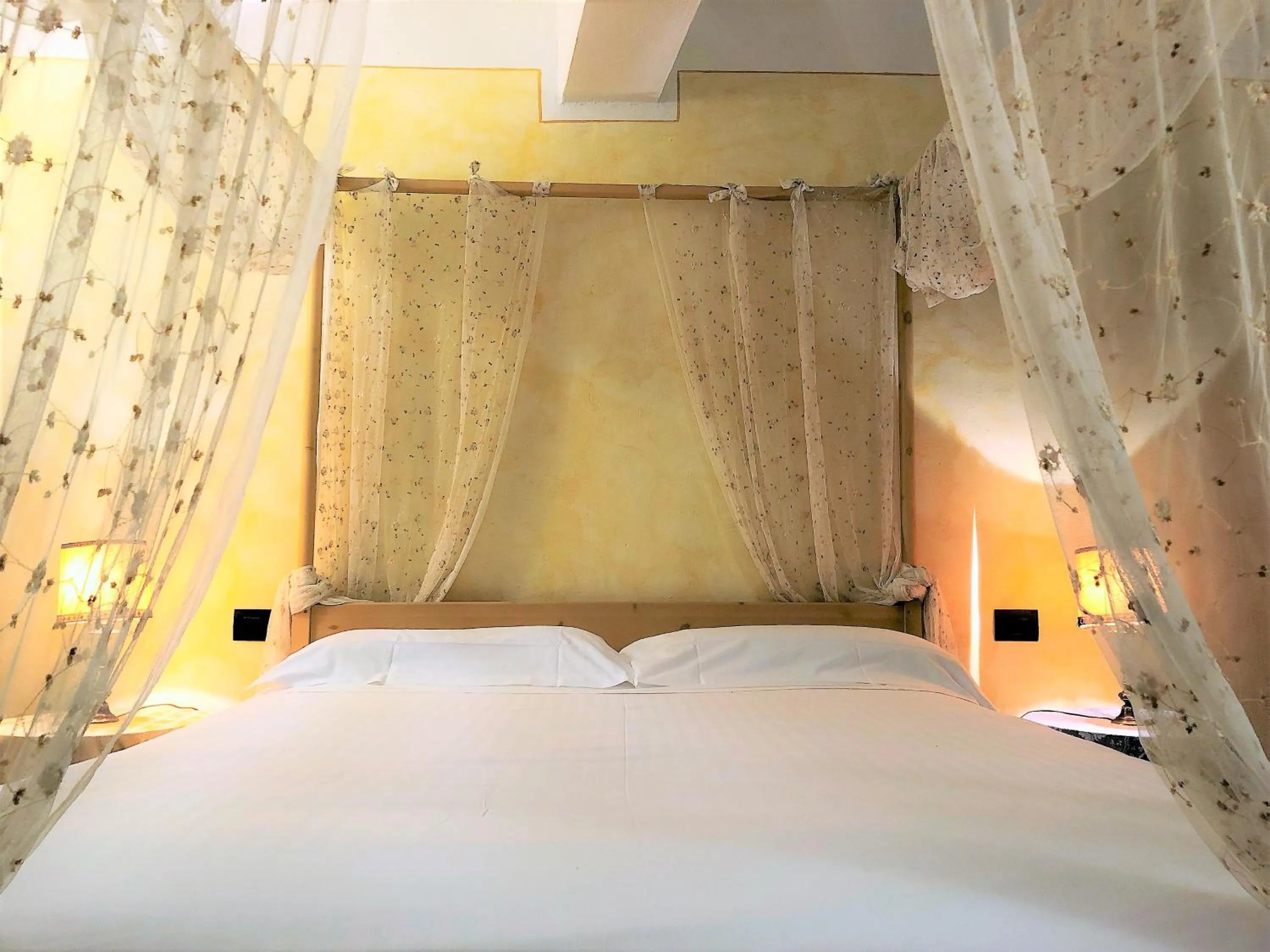 Bed in SIENA ROMANTIC EXPERIENCE