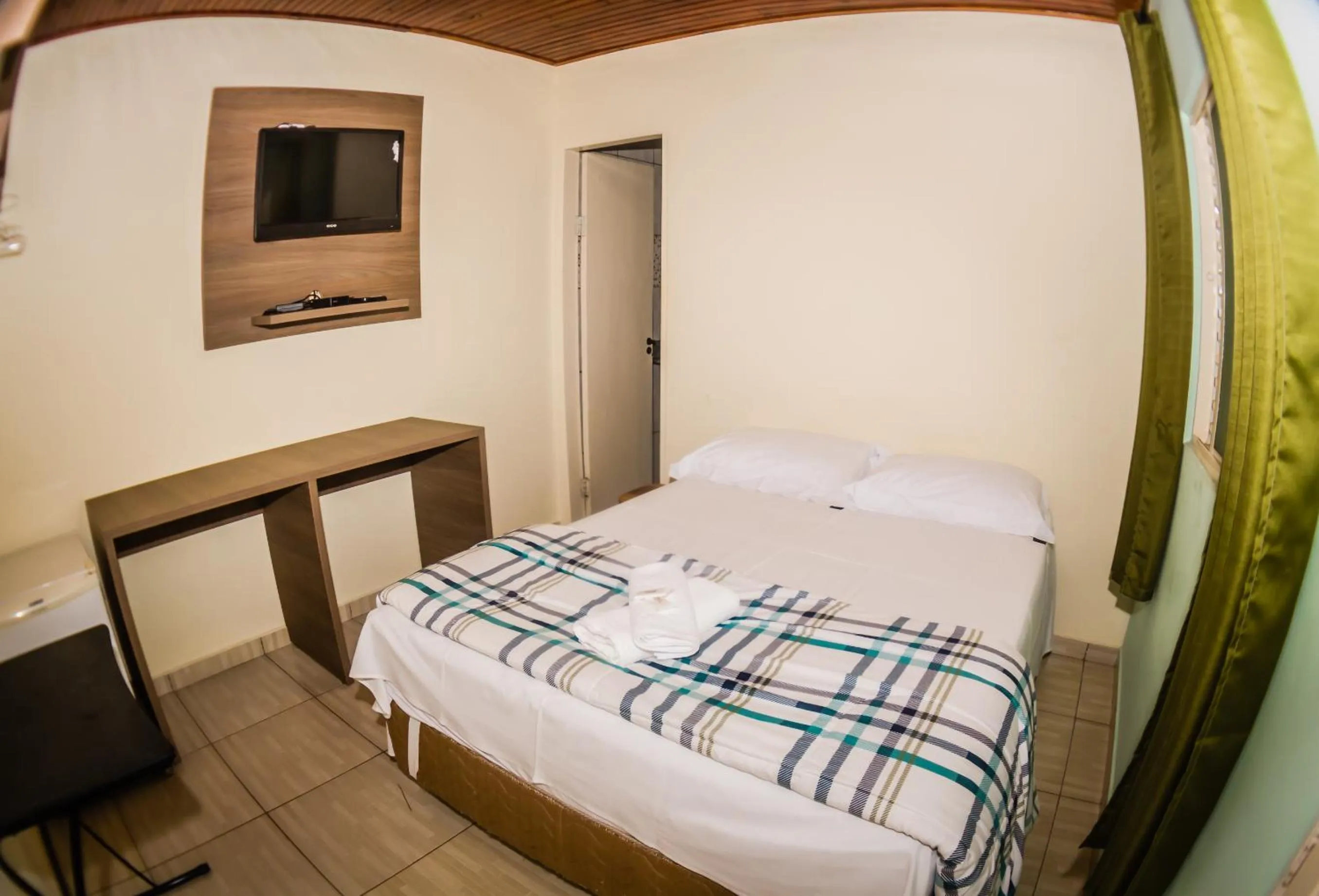 Bed in Pousada dos Guias