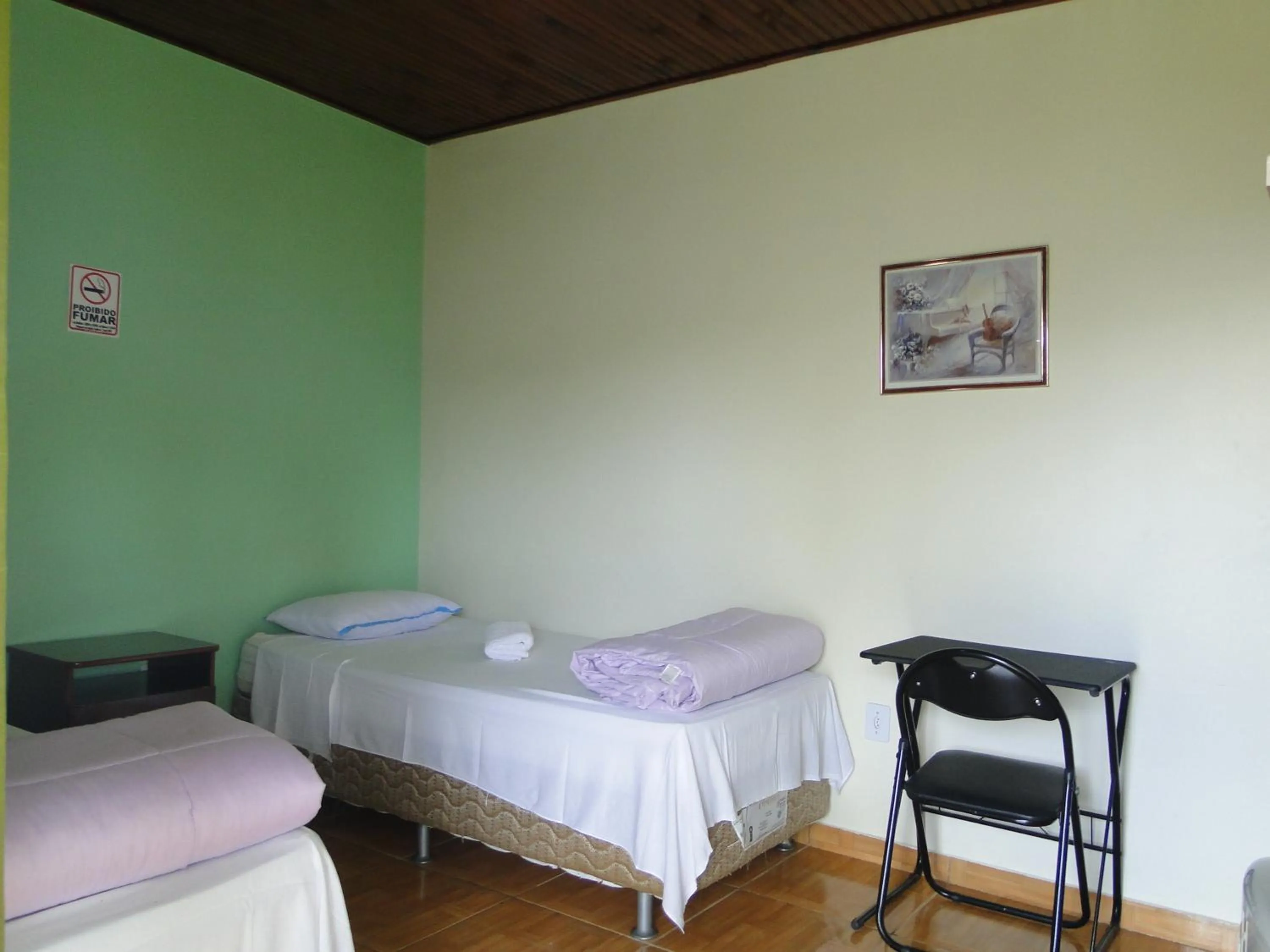 Bed in Pousada dos Guias