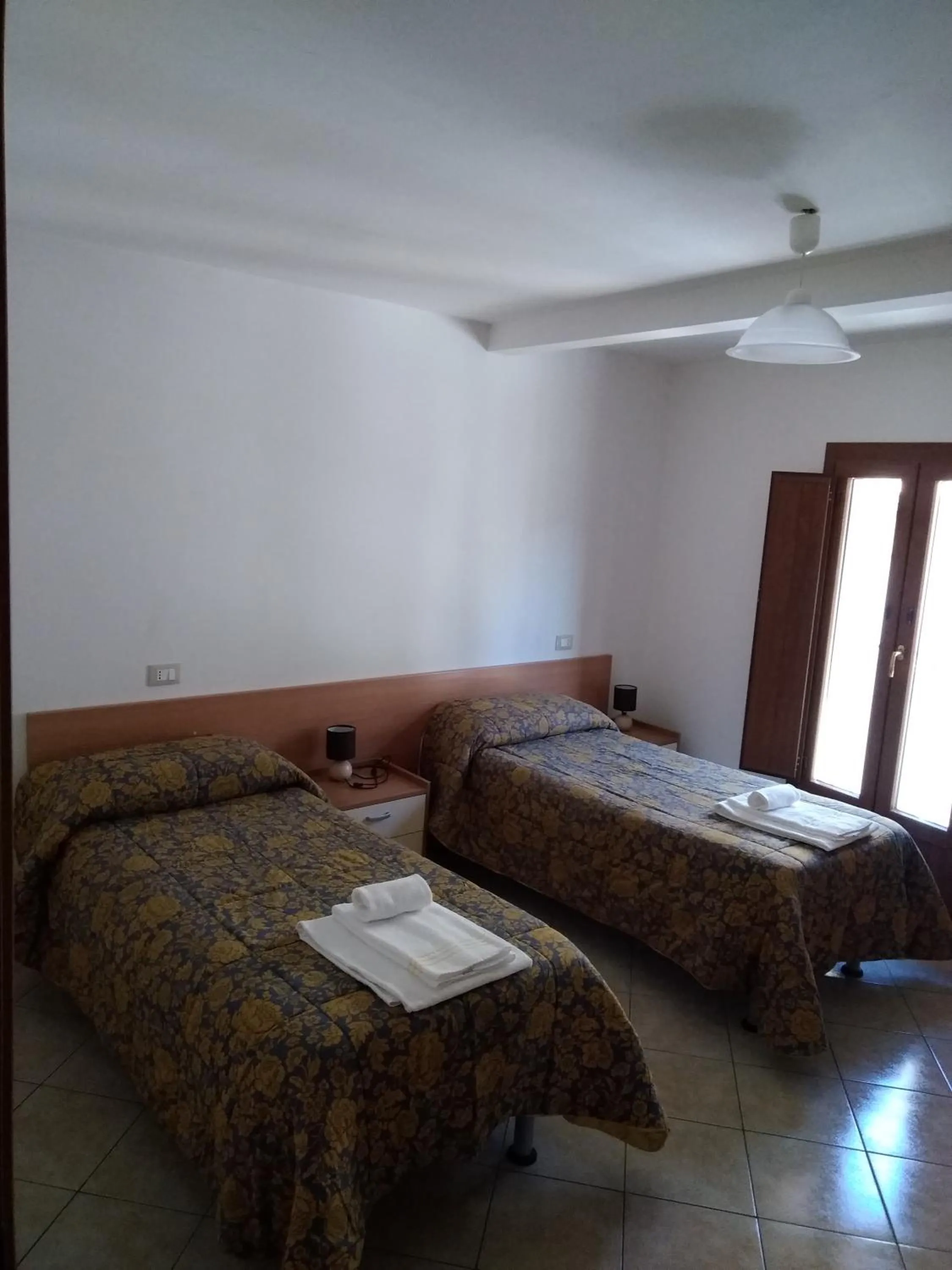 Bed in Il Narciso appartamenti