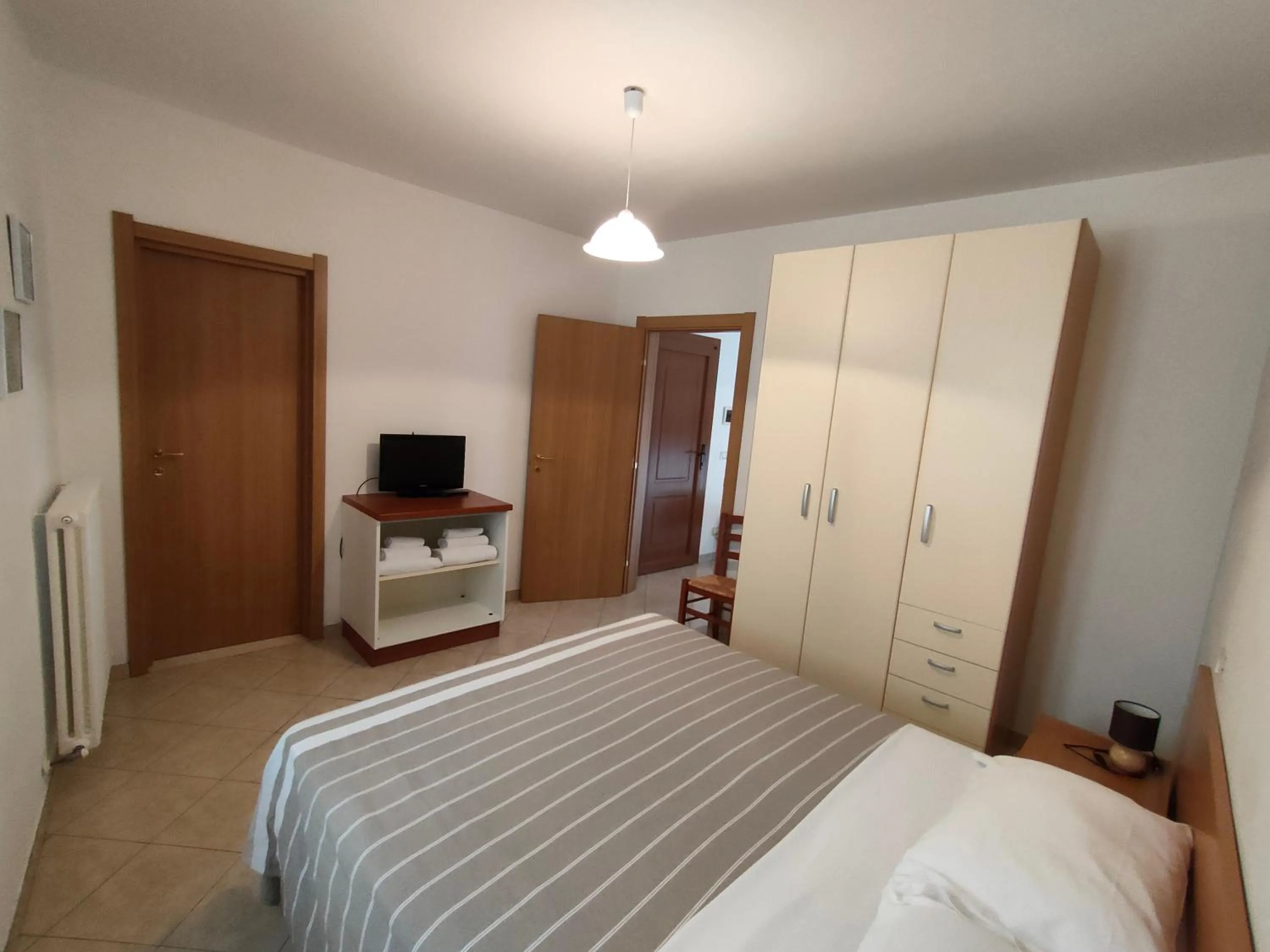 Bed in Il Narciso appartamenti