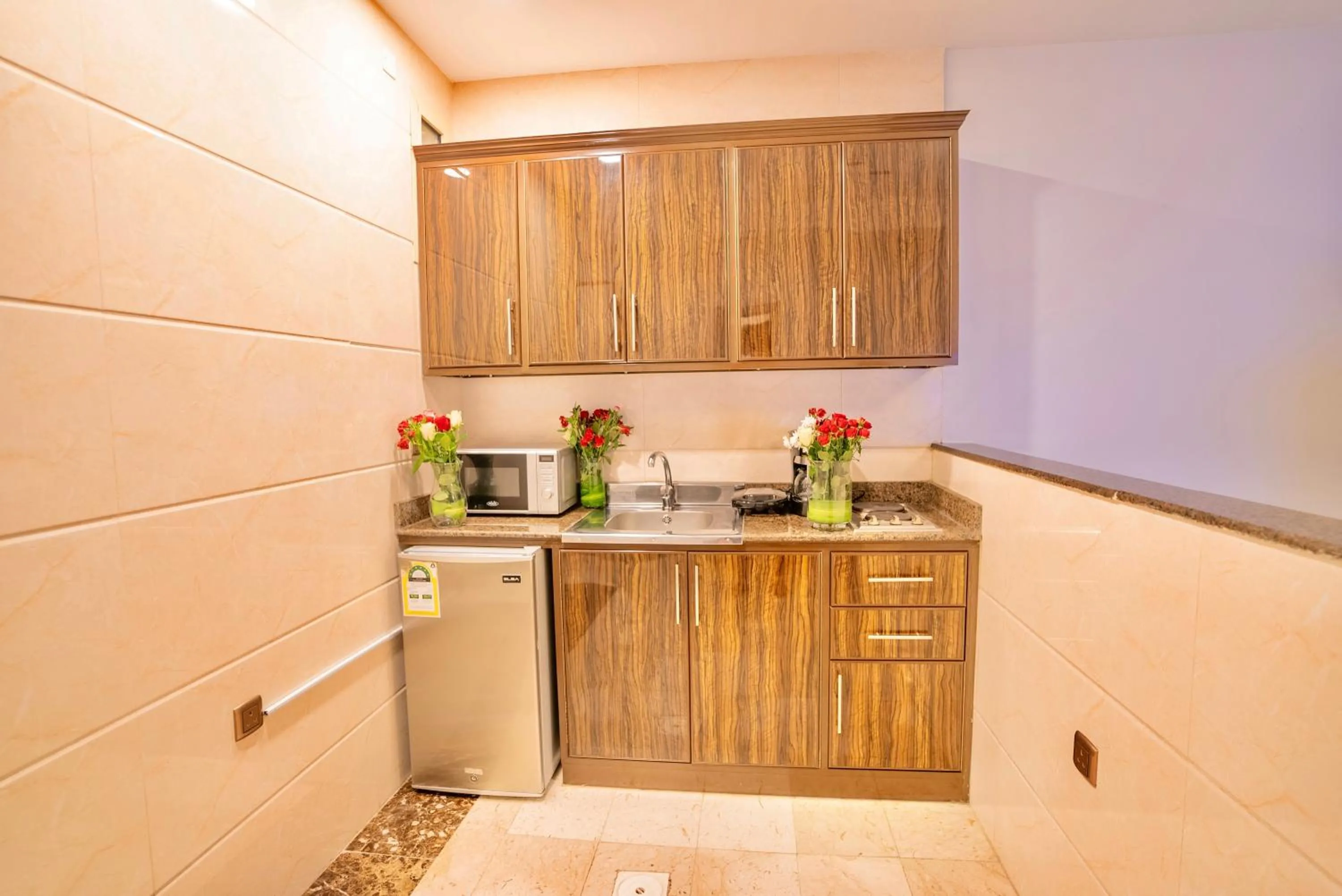 Kitchen or kitchenette in Laten Suites Serviced Apartment Al Naseem