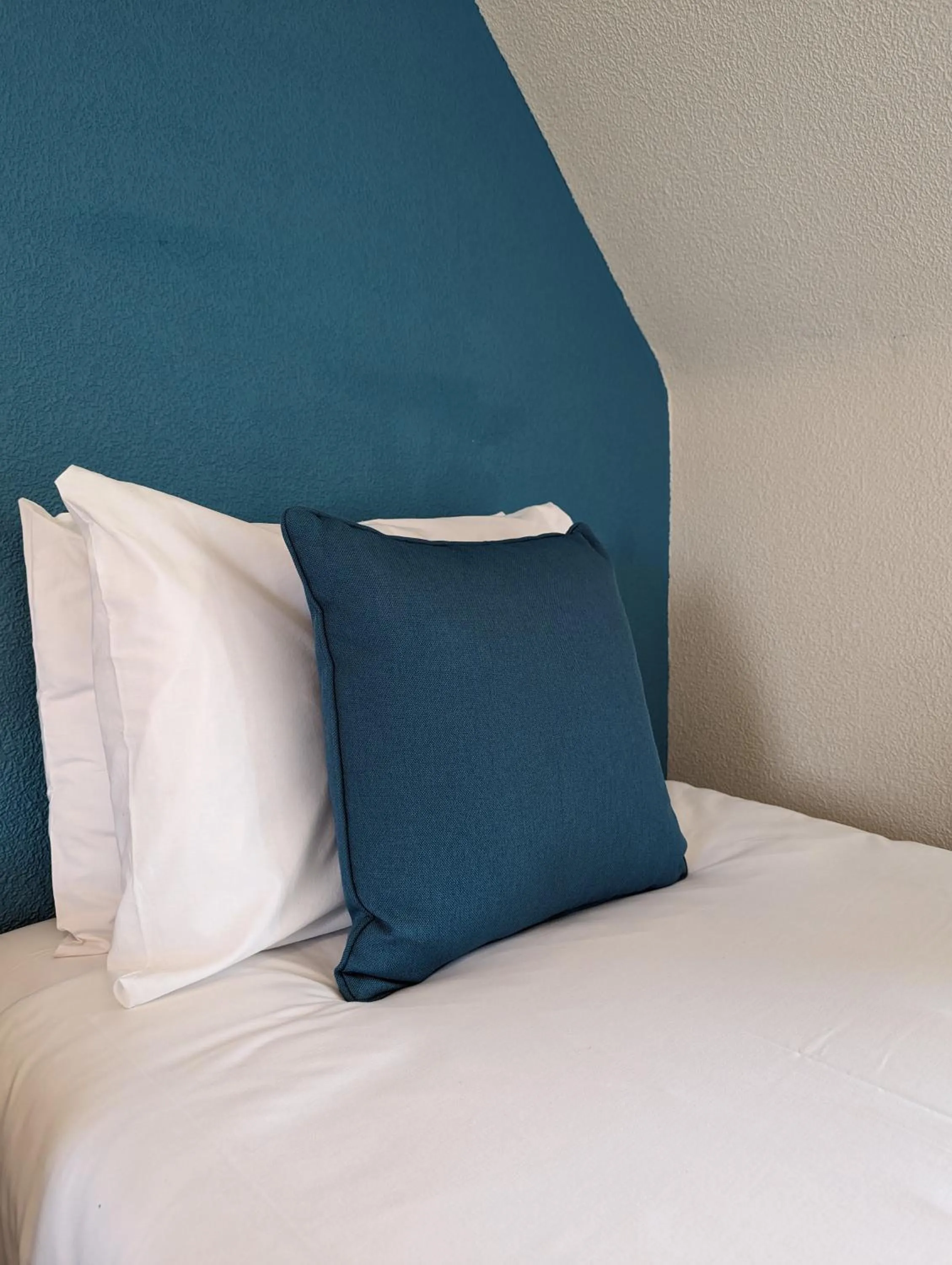 Bed in The Coo's Guest House