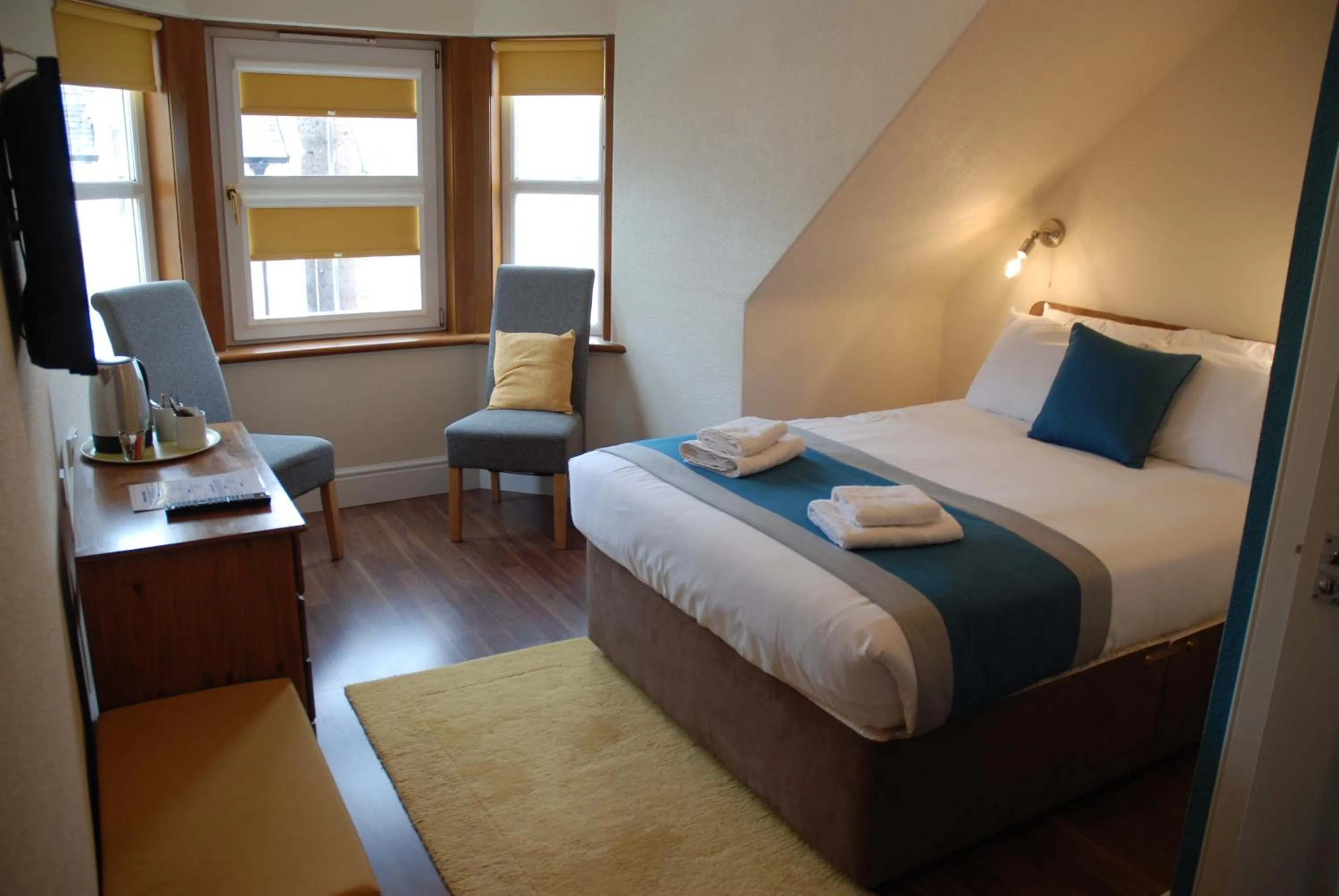 Bed in The Coo's Guest House