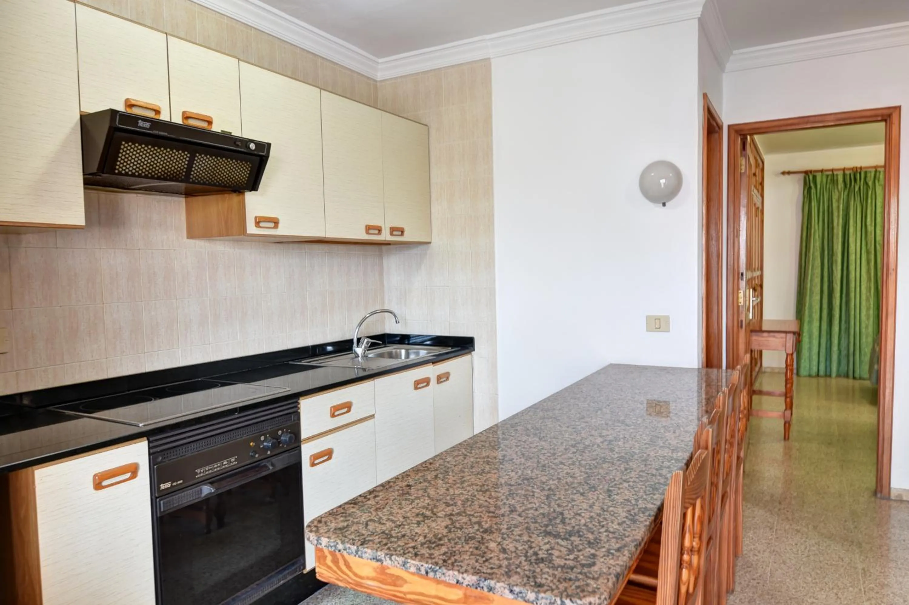 Communal kitchen in Apartamentos Isabel