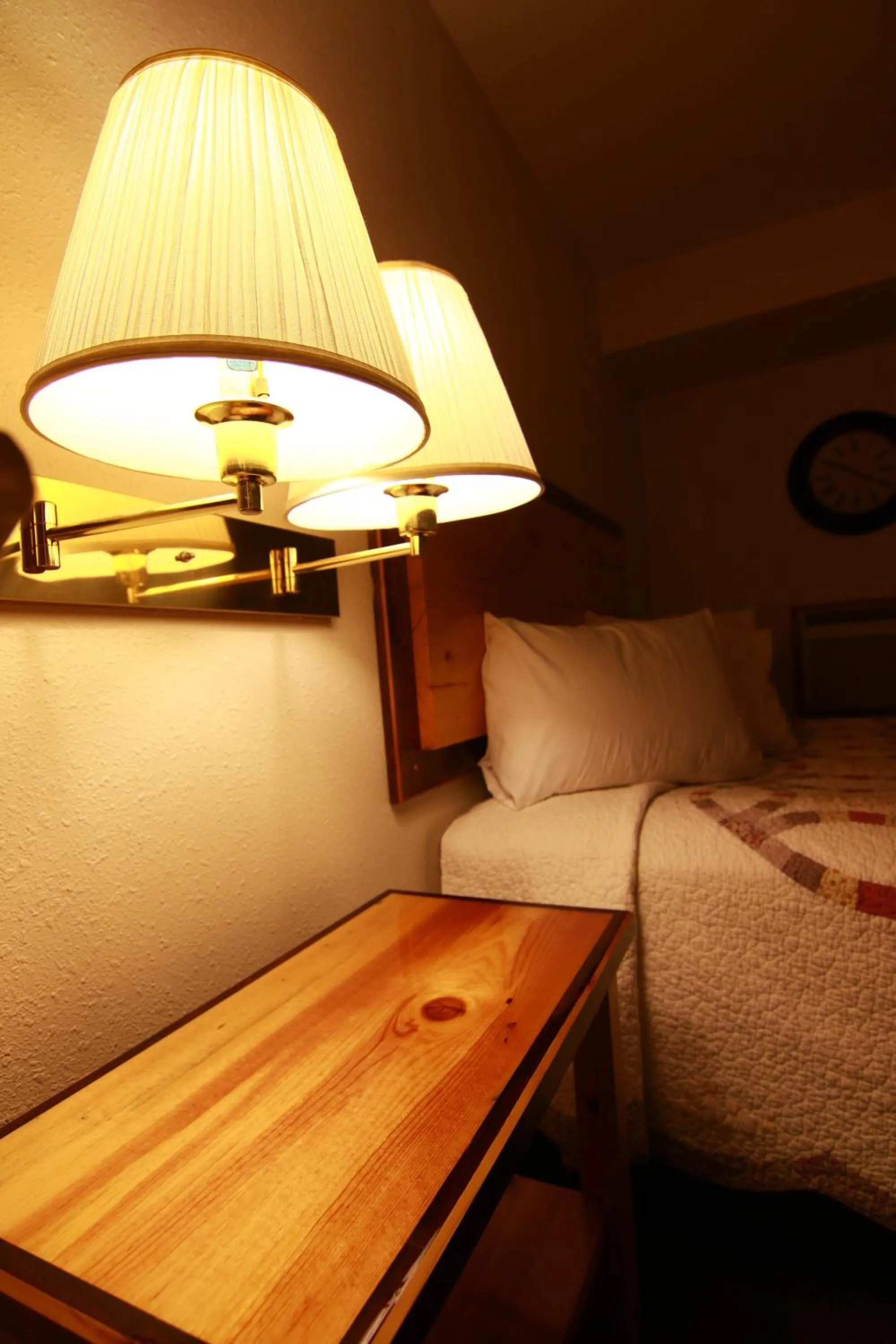Bed in Yellowstone Village Inn and Suites