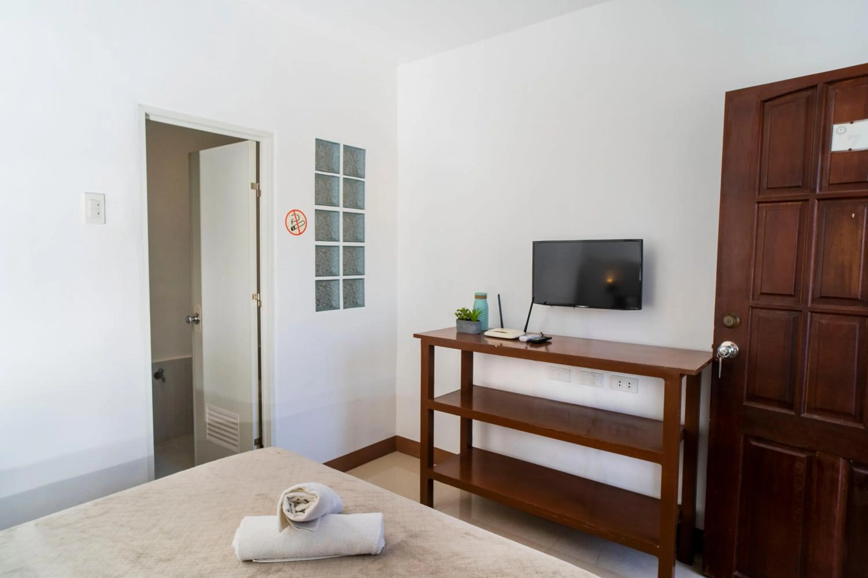 Bed in Panglao Village Court Apartment Stay Inn