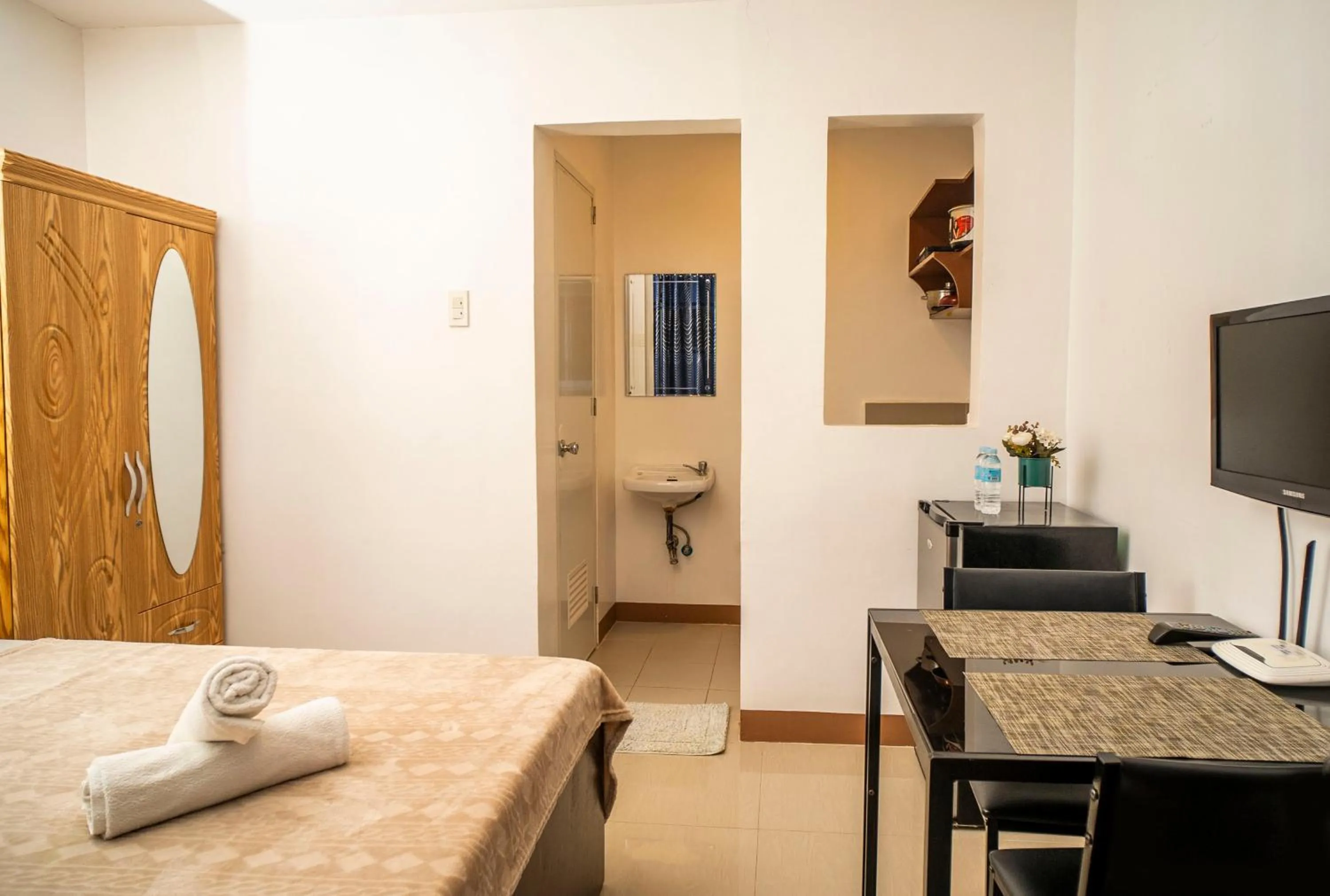 Bed in Panglao Village Court Apartment Stay Inn