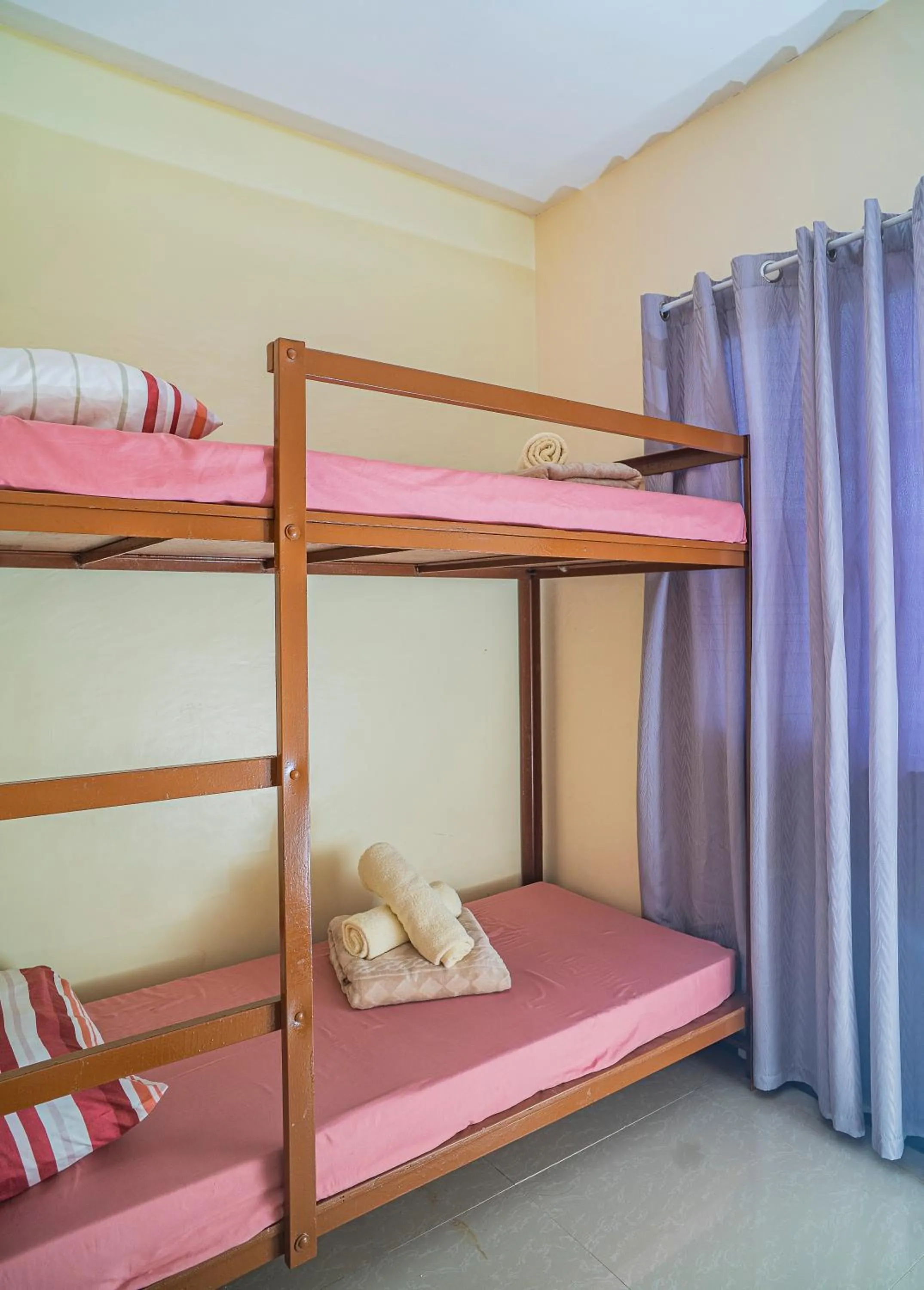 Bed in Panglao Village Court Apartment Stay Inn