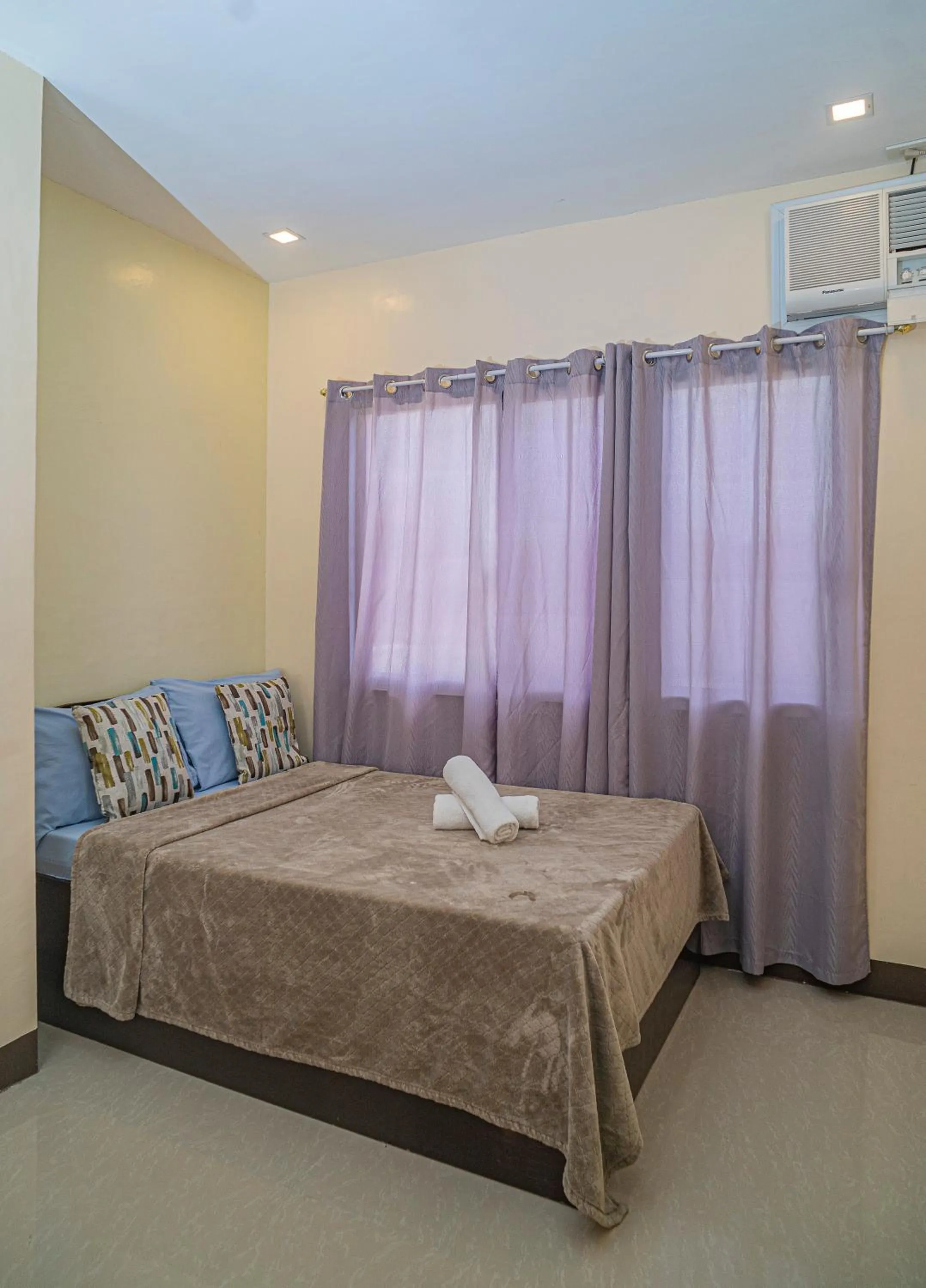 Bed in Panglao Village Court Apartment Stay Inn