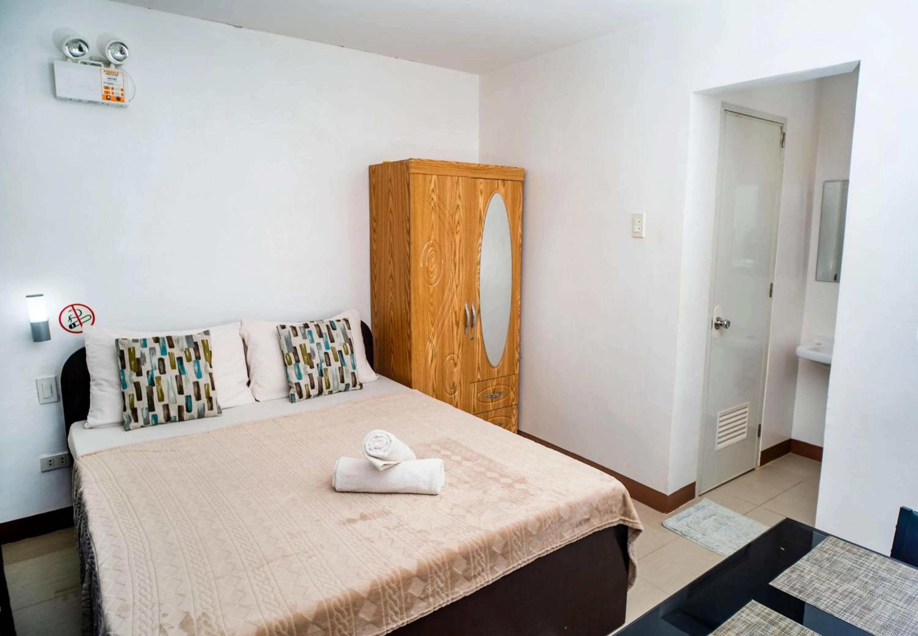 Bed in Panglao Village Court Apartment Stay Inn