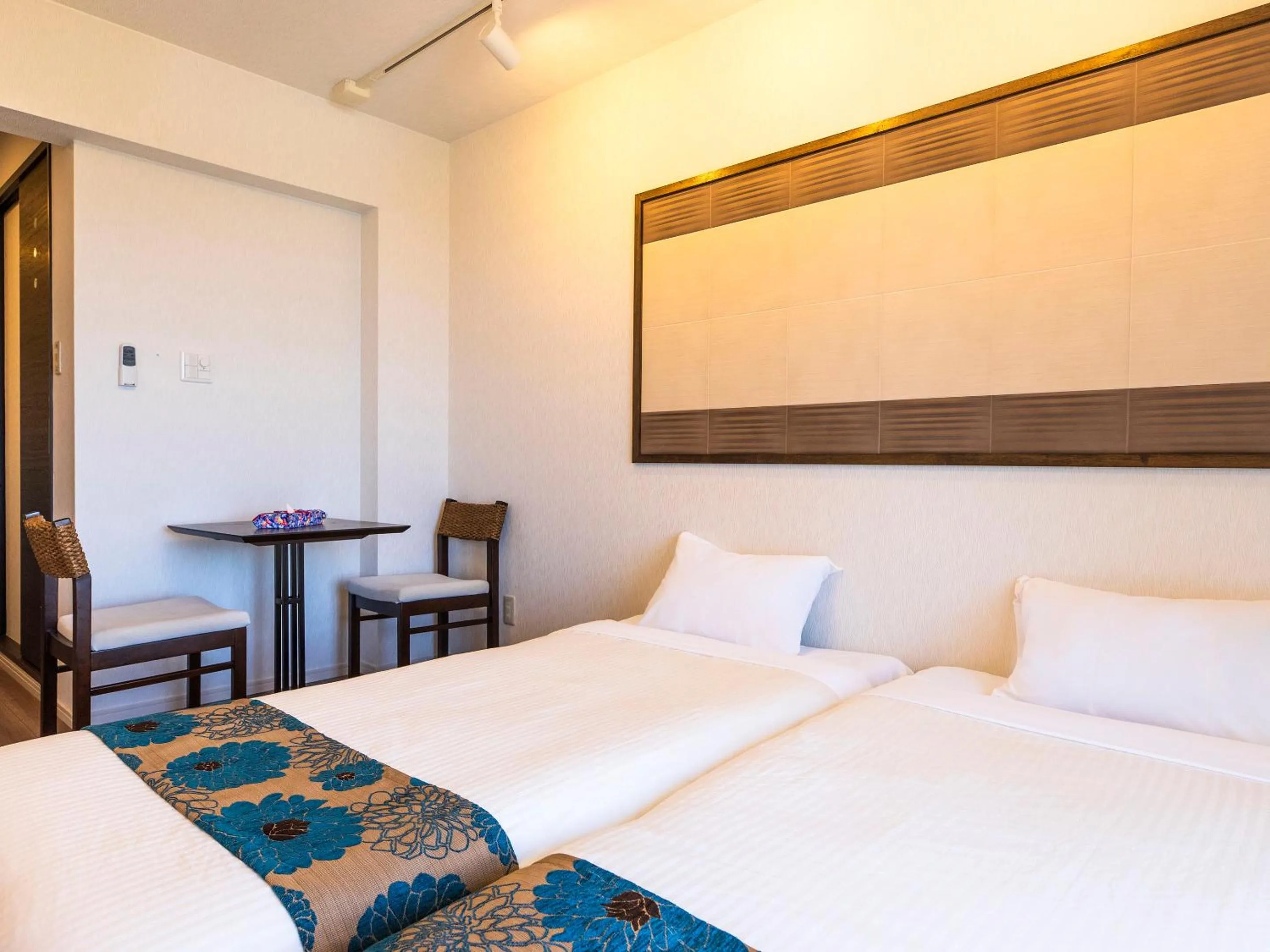 Photo of the whole room, Bed in Yukurina Resort Okinawa