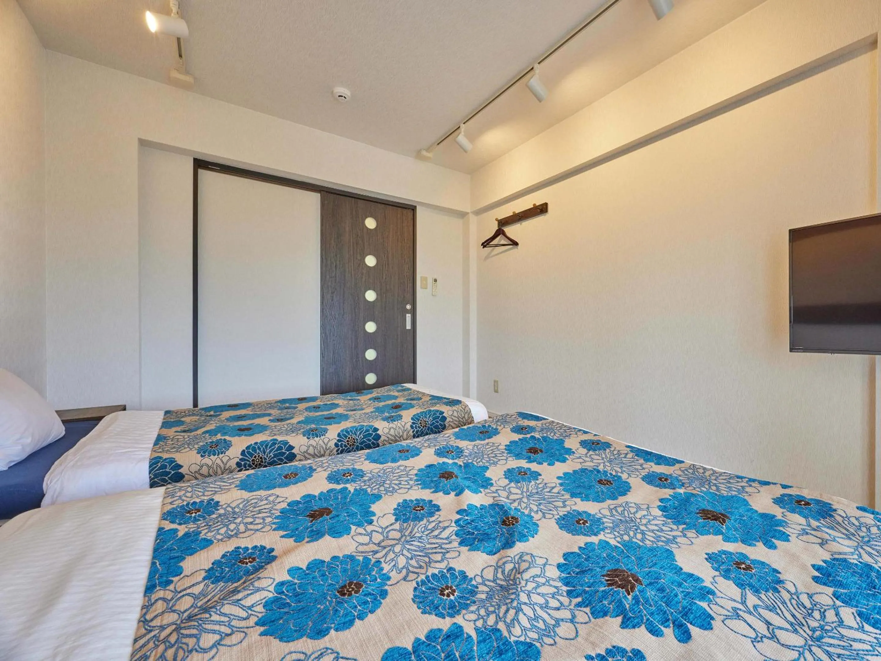 Photo of the whole room, Bed in Yukurina Resort Okinawa