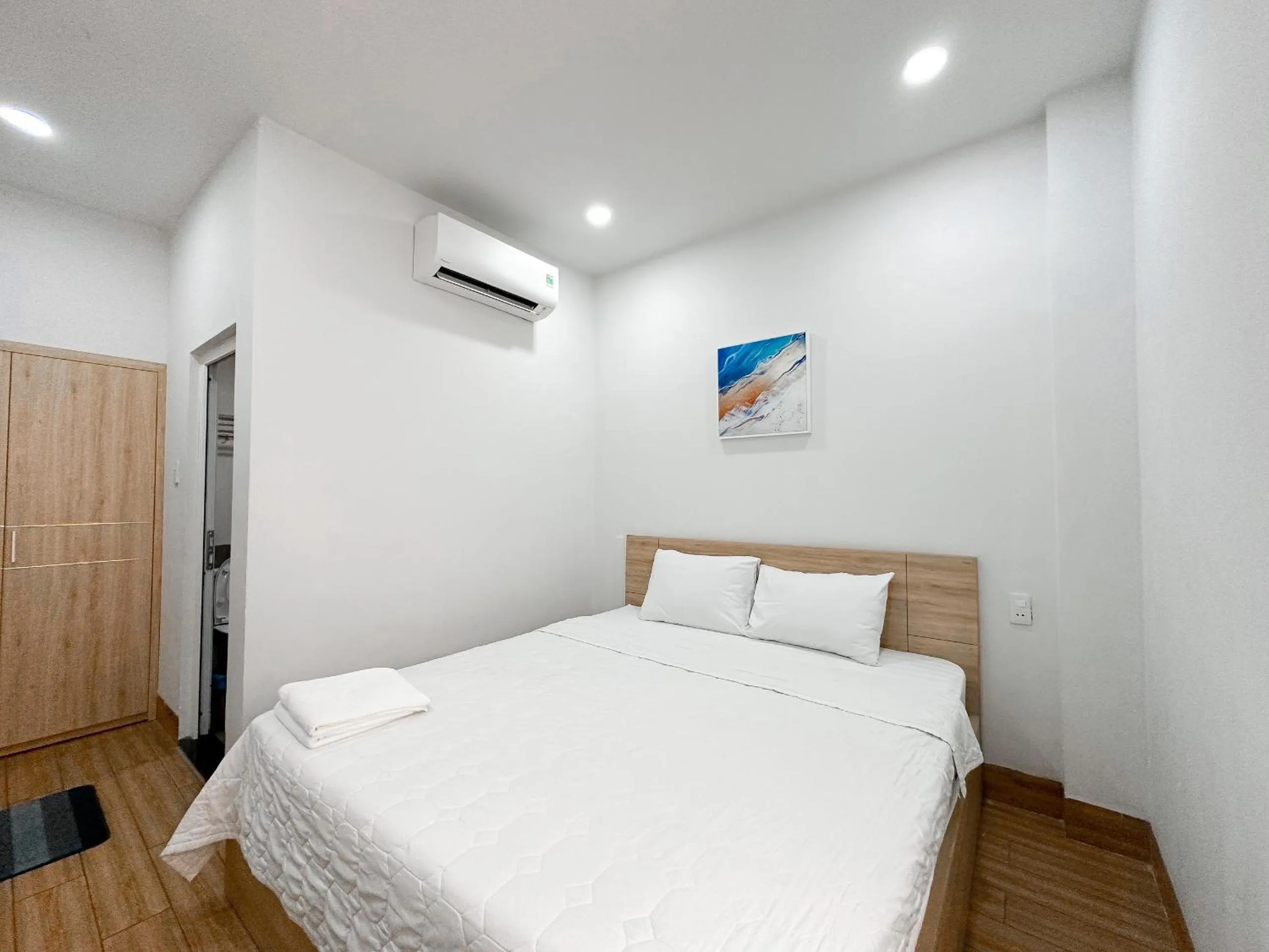 Bed in AQUA Seaview Hotel