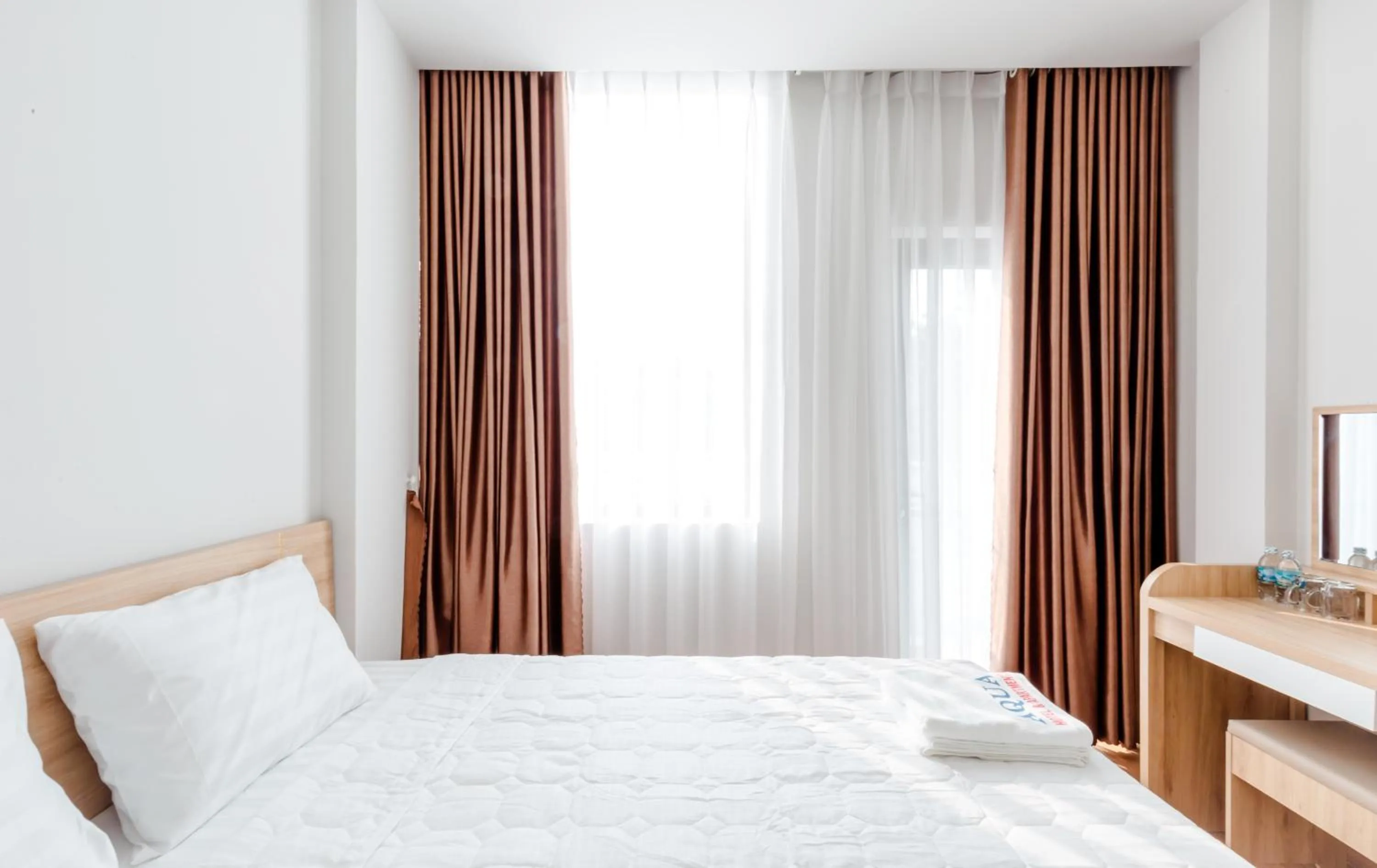 Bedroom, Bed in AQUA Seaview Hotel