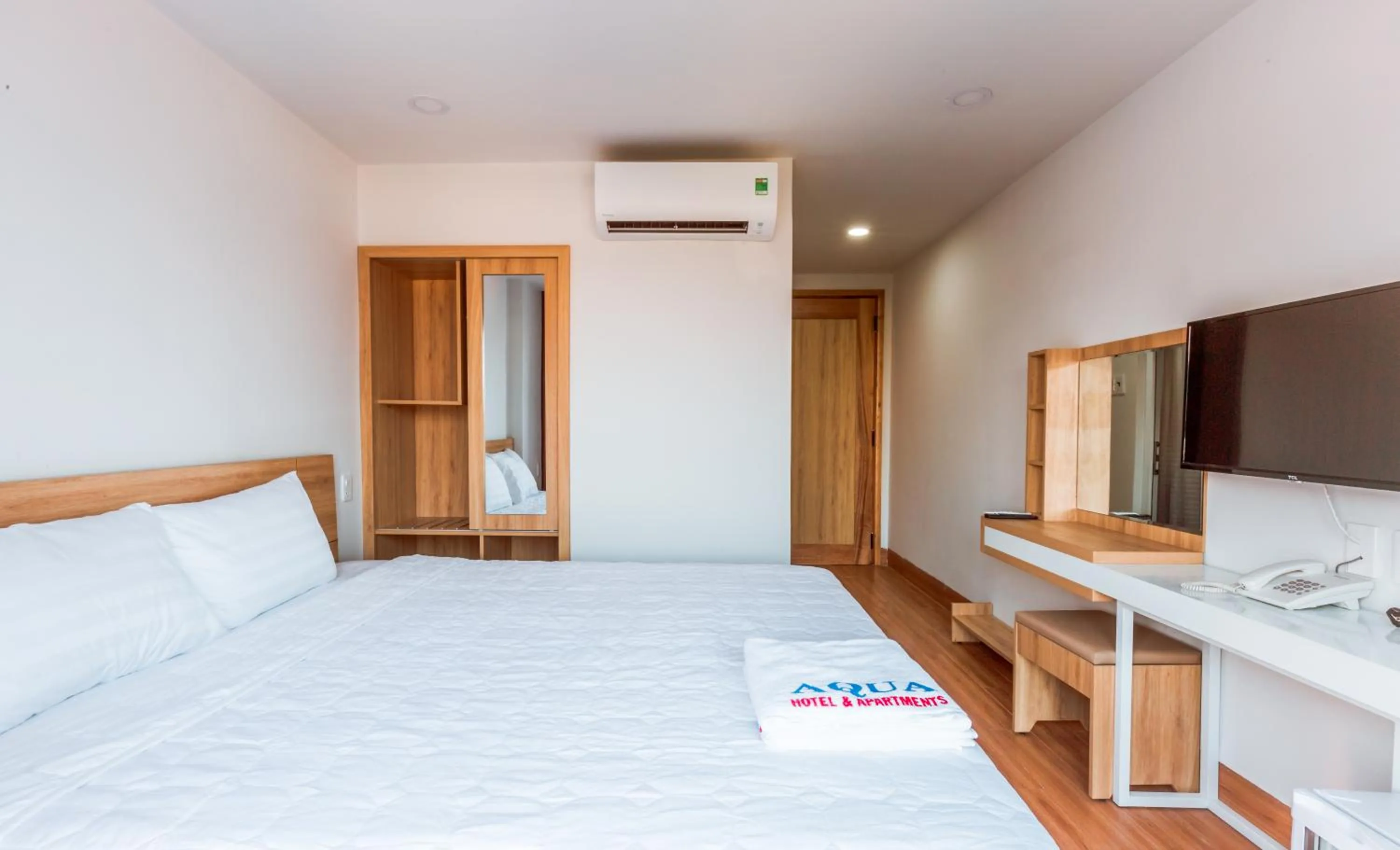 Bed in AQUA Seaview Hotel