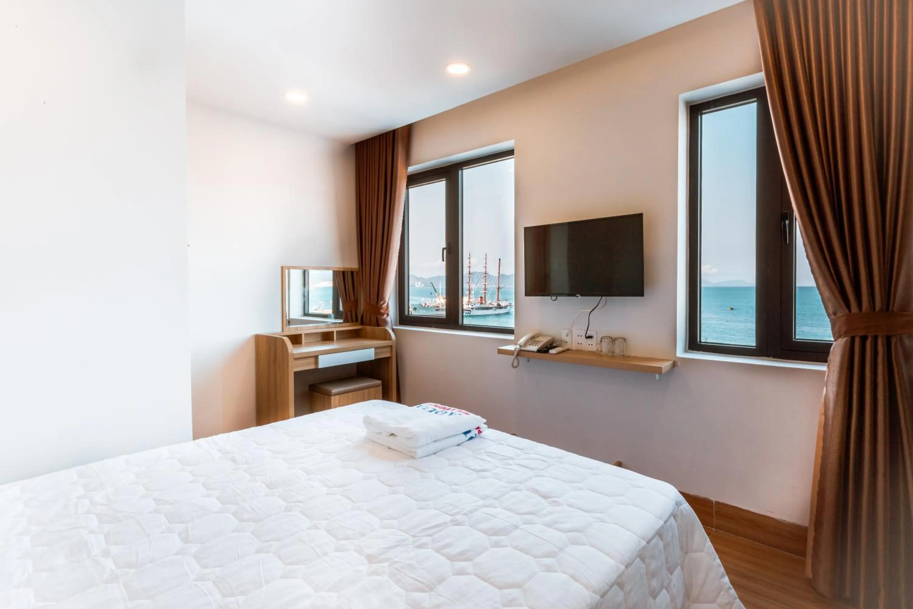 Bedroom, Bed in AQUA Seaview Hotel