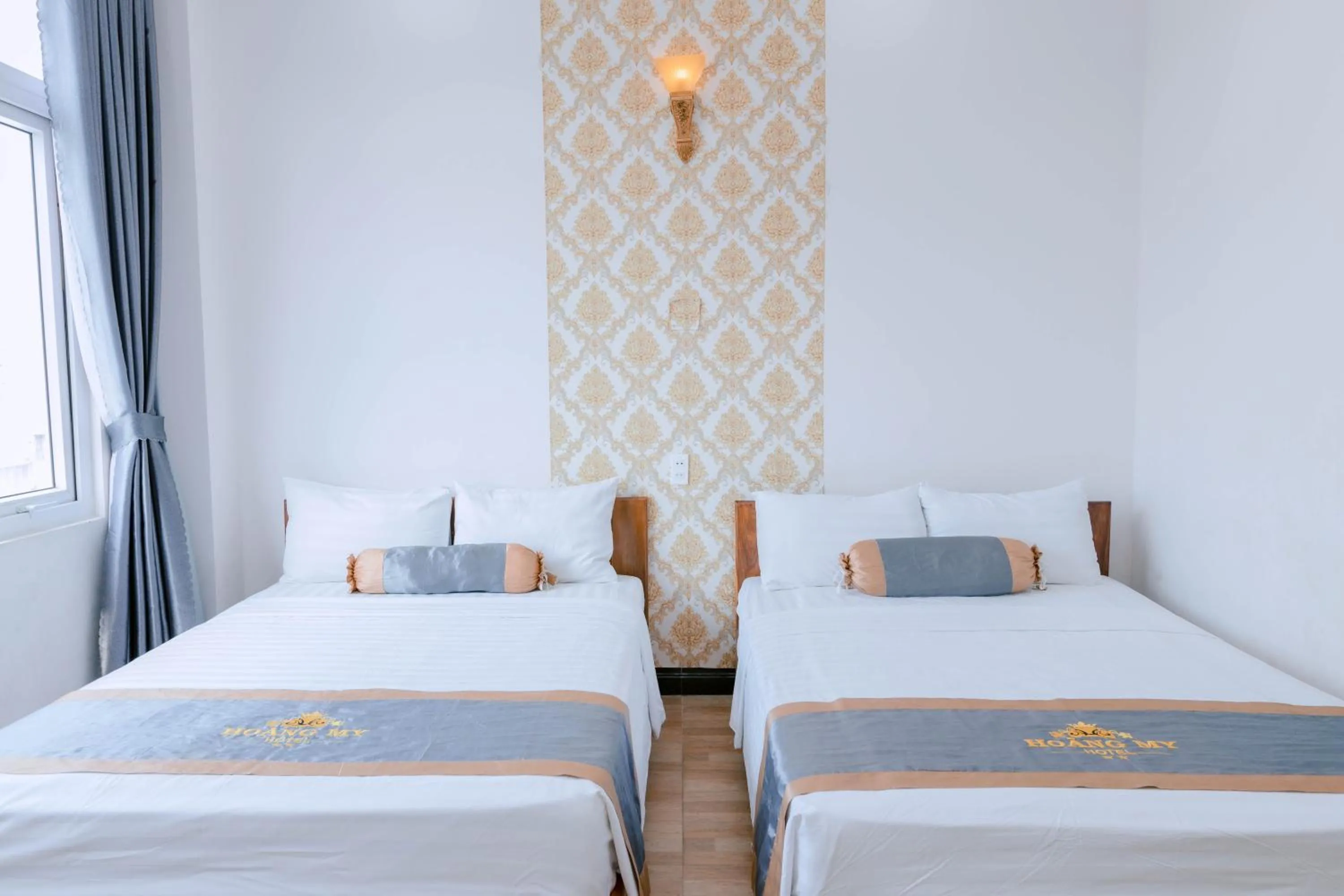 Bed in Khách sạn Hoàng My