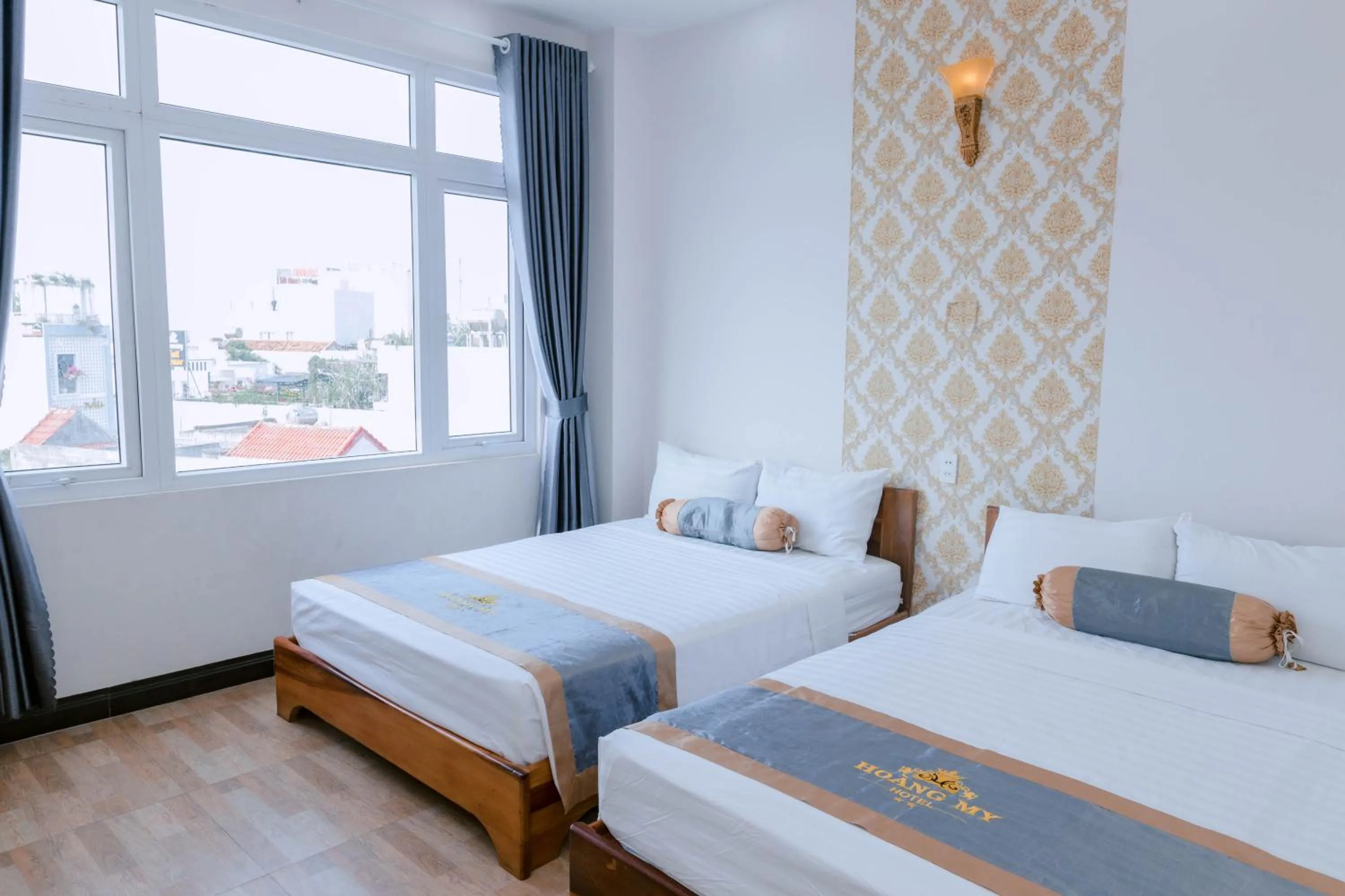 Bed in Khách sạn Hoàng My