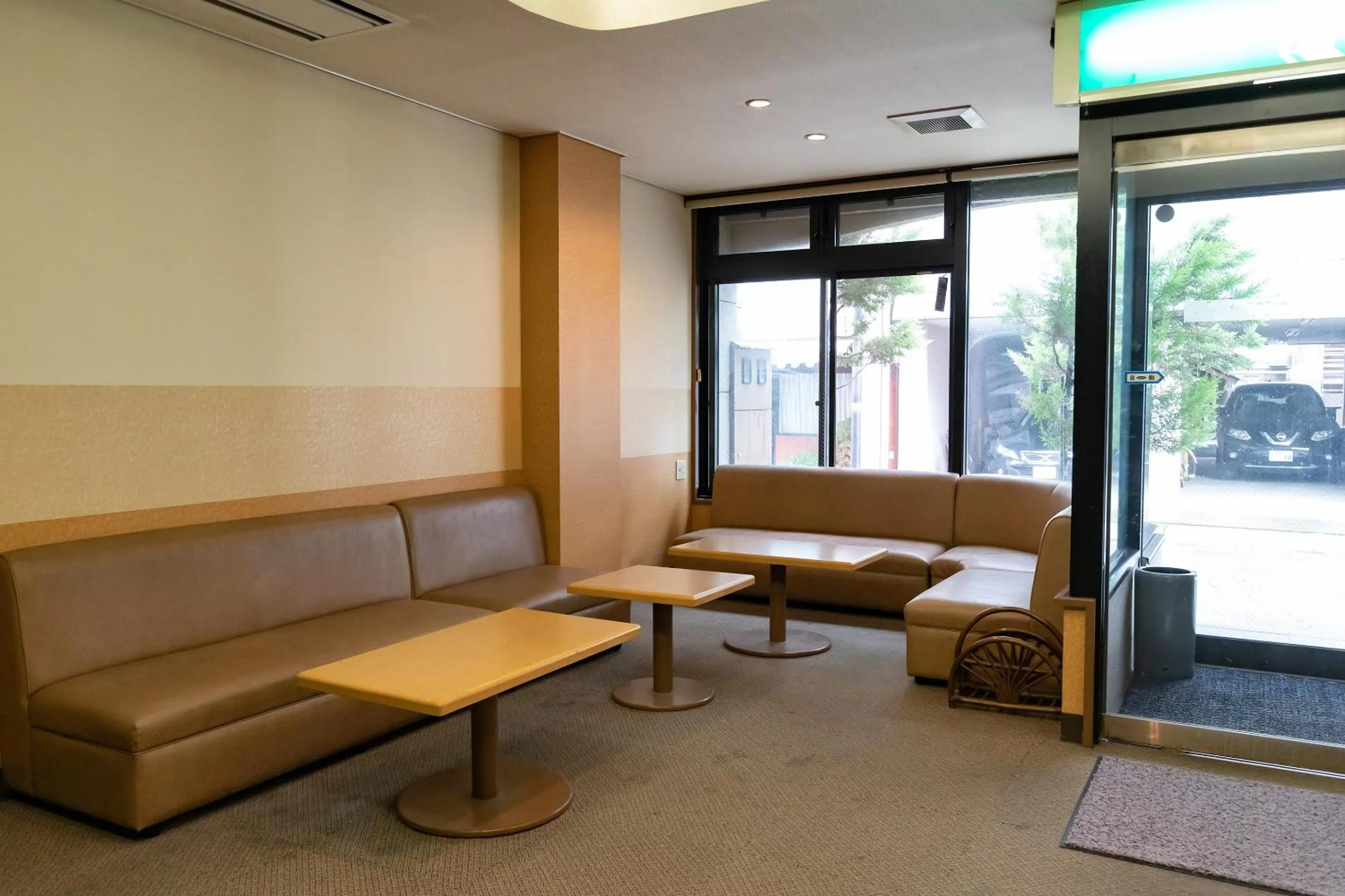 Seating area in Tabist Kanko Business Hotel Matsuyama Hida Takayama