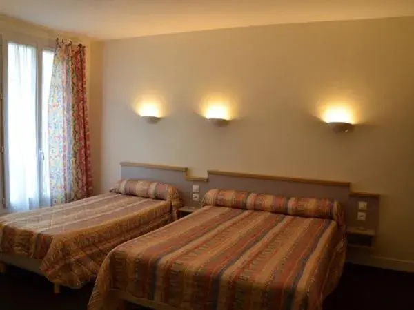 Bed in Hotel des Vosges Bed in Hotel des Vosges