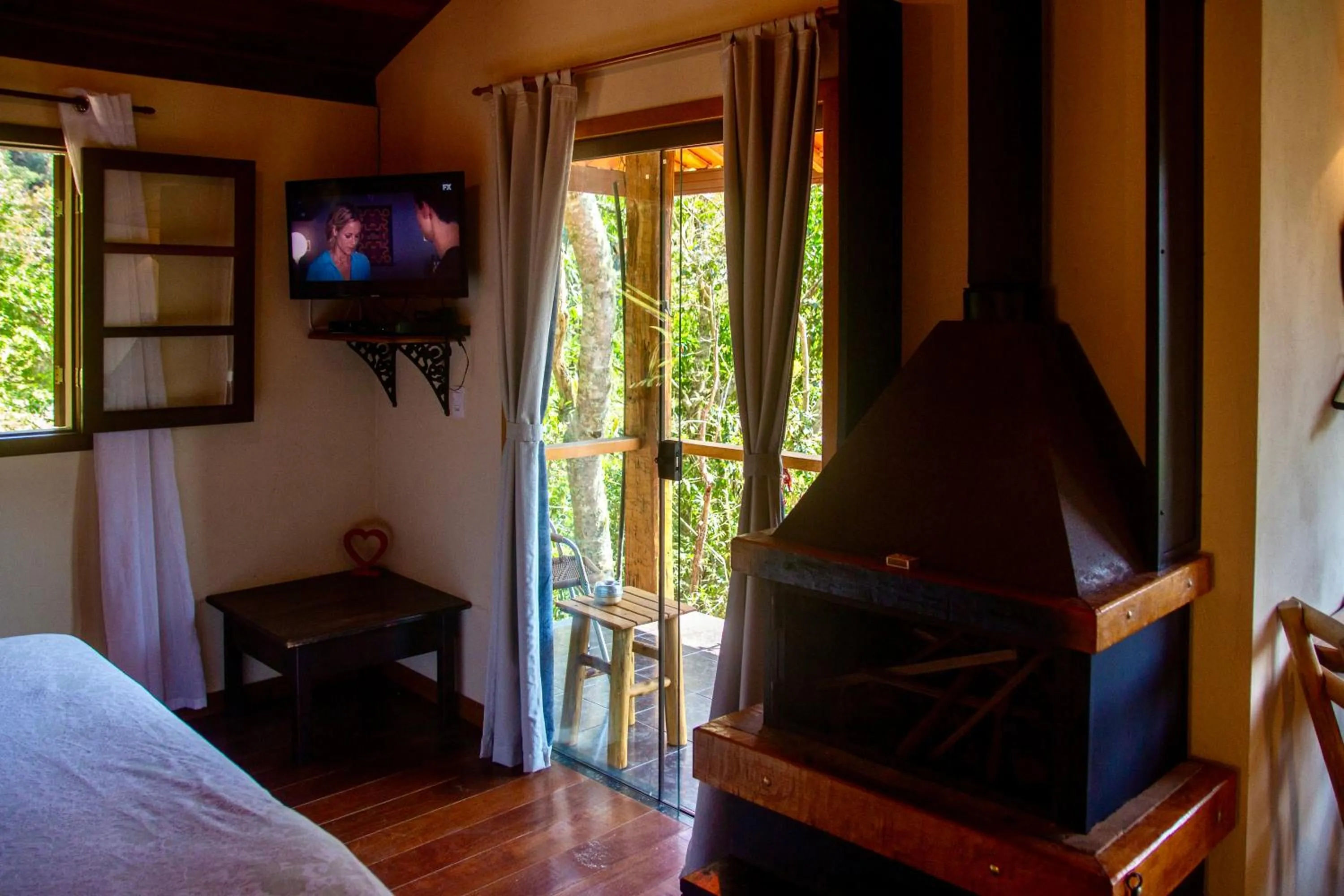 TV and multimedia, Bed in Pousada Moriá
