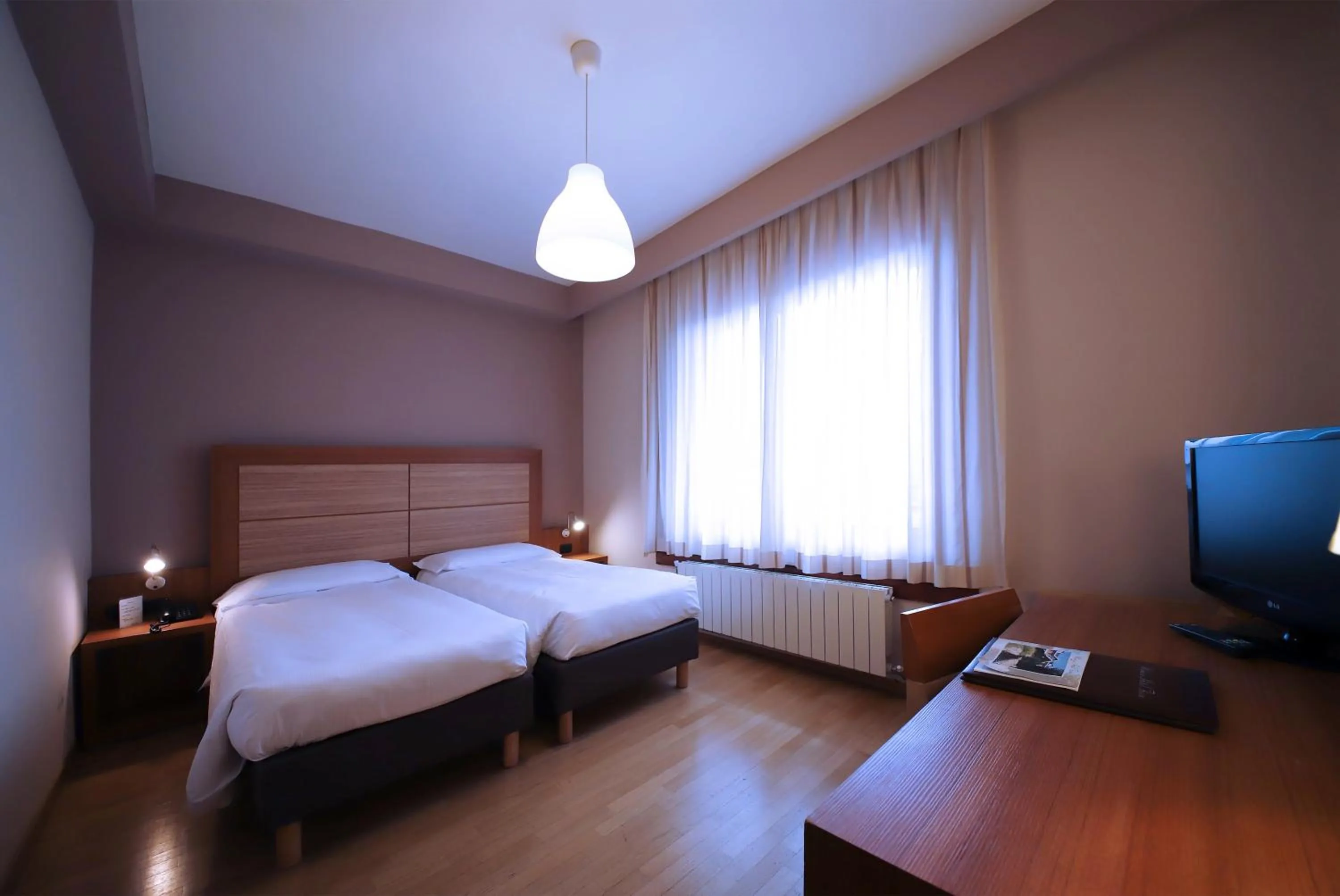 Bed in Monica Hotel Fiera