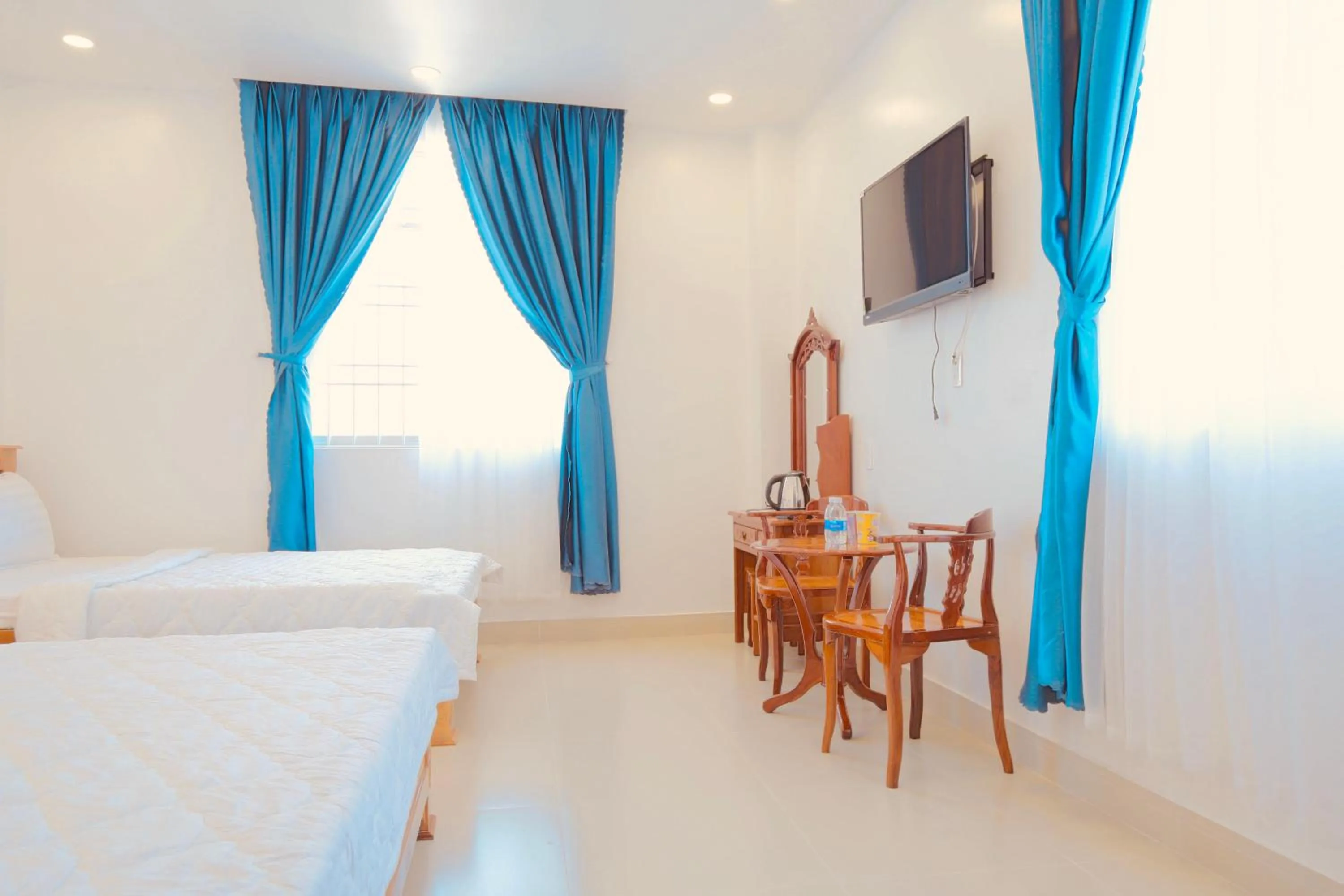 Bed in Khách sạn Tuyết Hiển