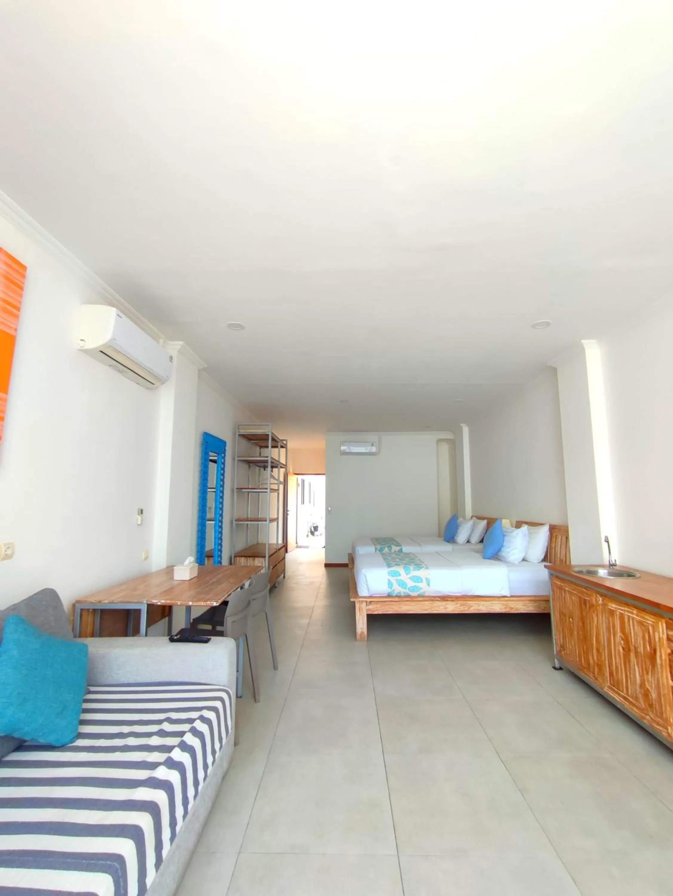 Bed in Triple 8 Suites