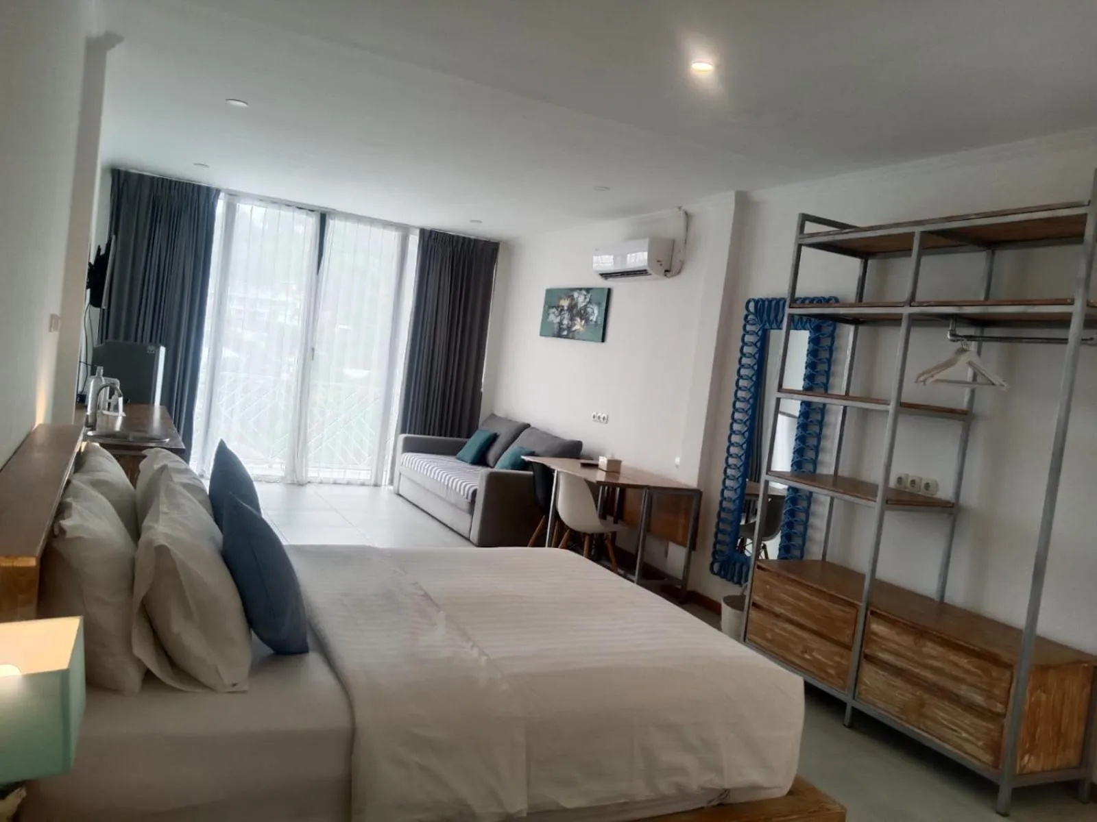 Photo of the whole room, Bed in Triple 8 Suites