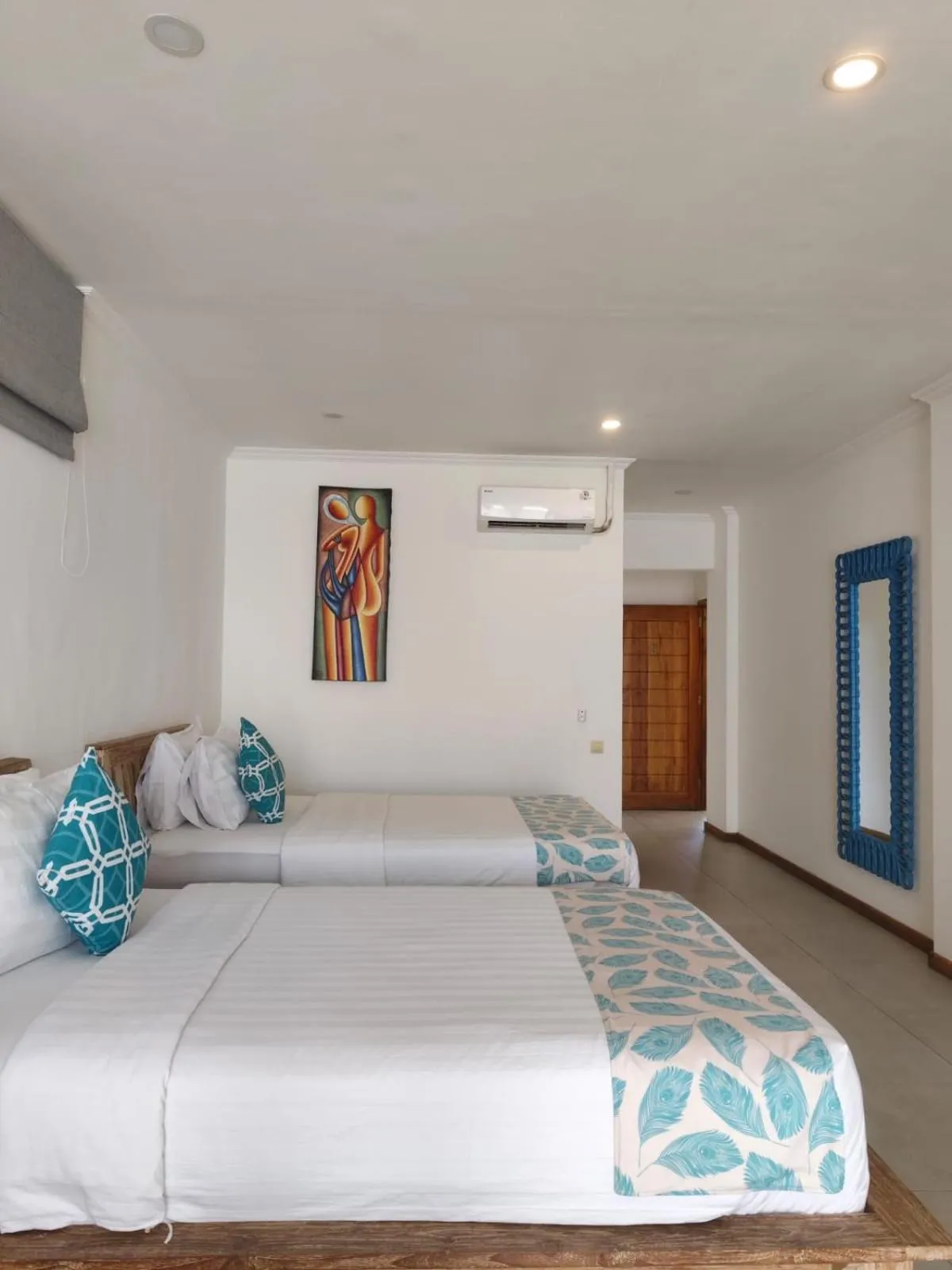 Bed in Triple 8 Suites