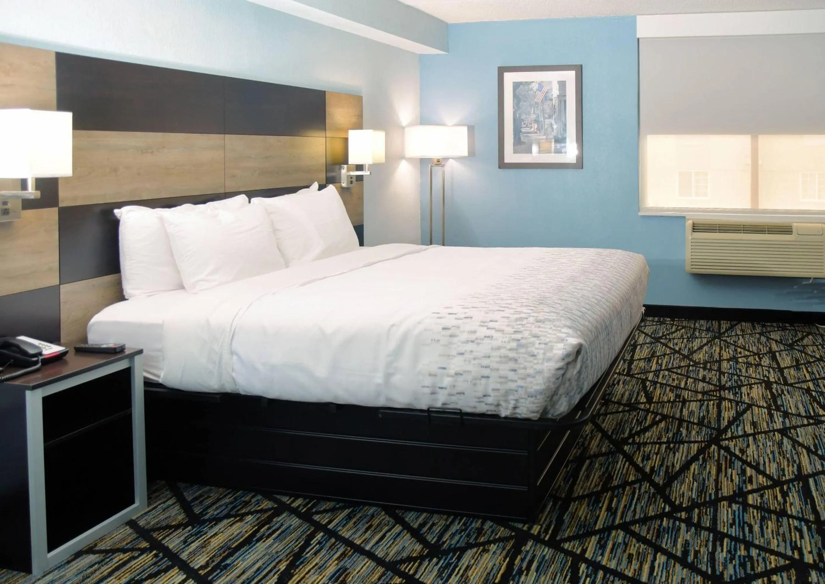 Bedroom, Bed in Clarion Pointe Jacksonville near Camp Lejeune