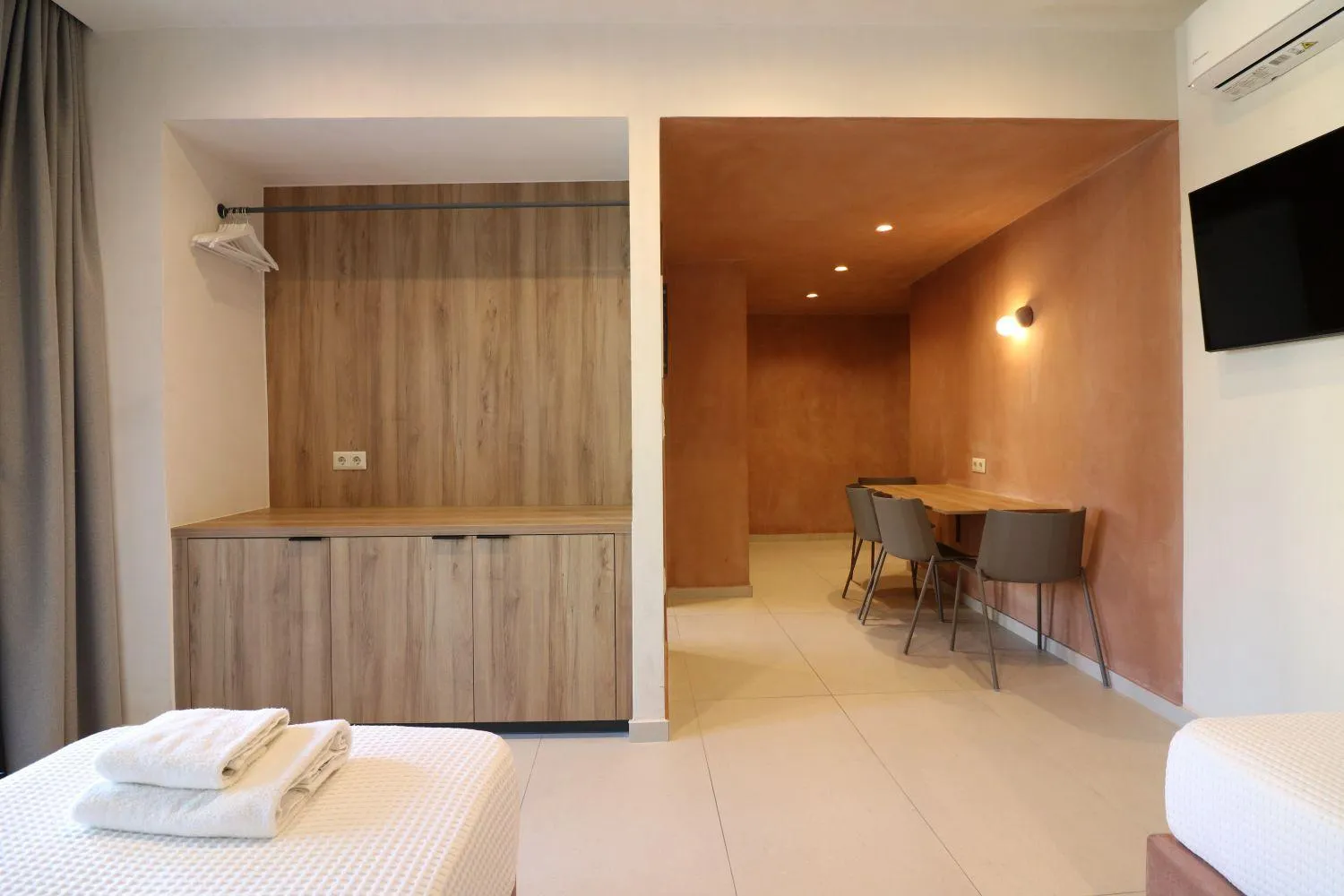 Bed in Philoxenia Apartments