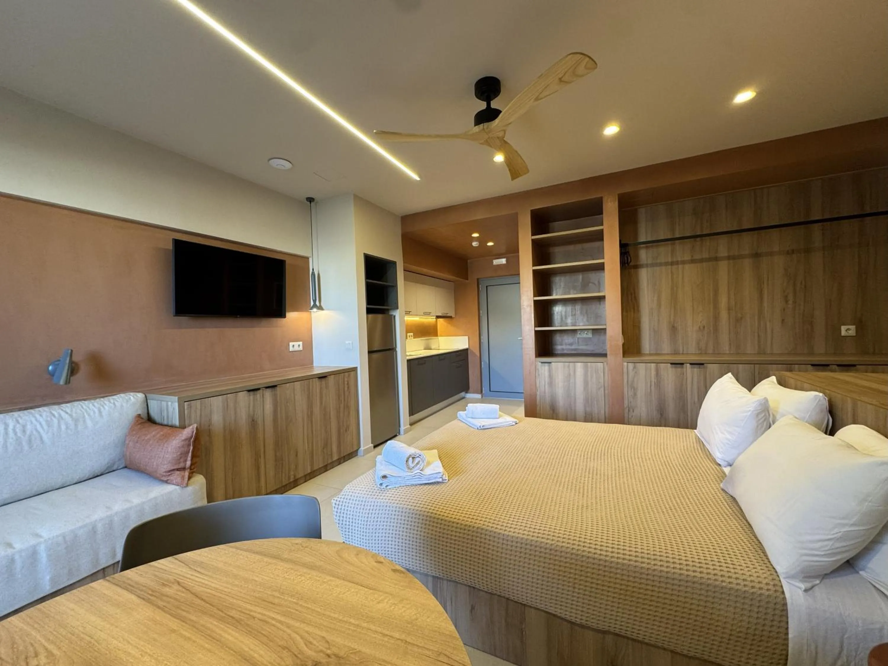 Bed in Philoxenia Apartments