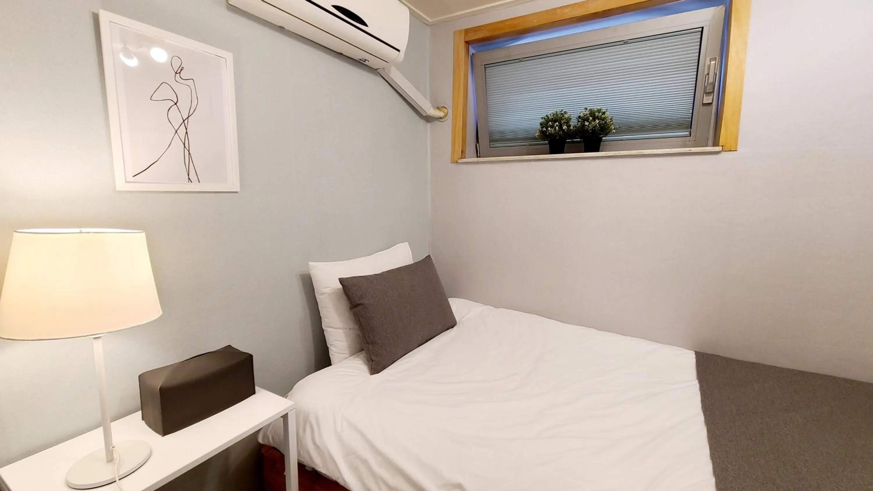 Bed in DW Design Residence