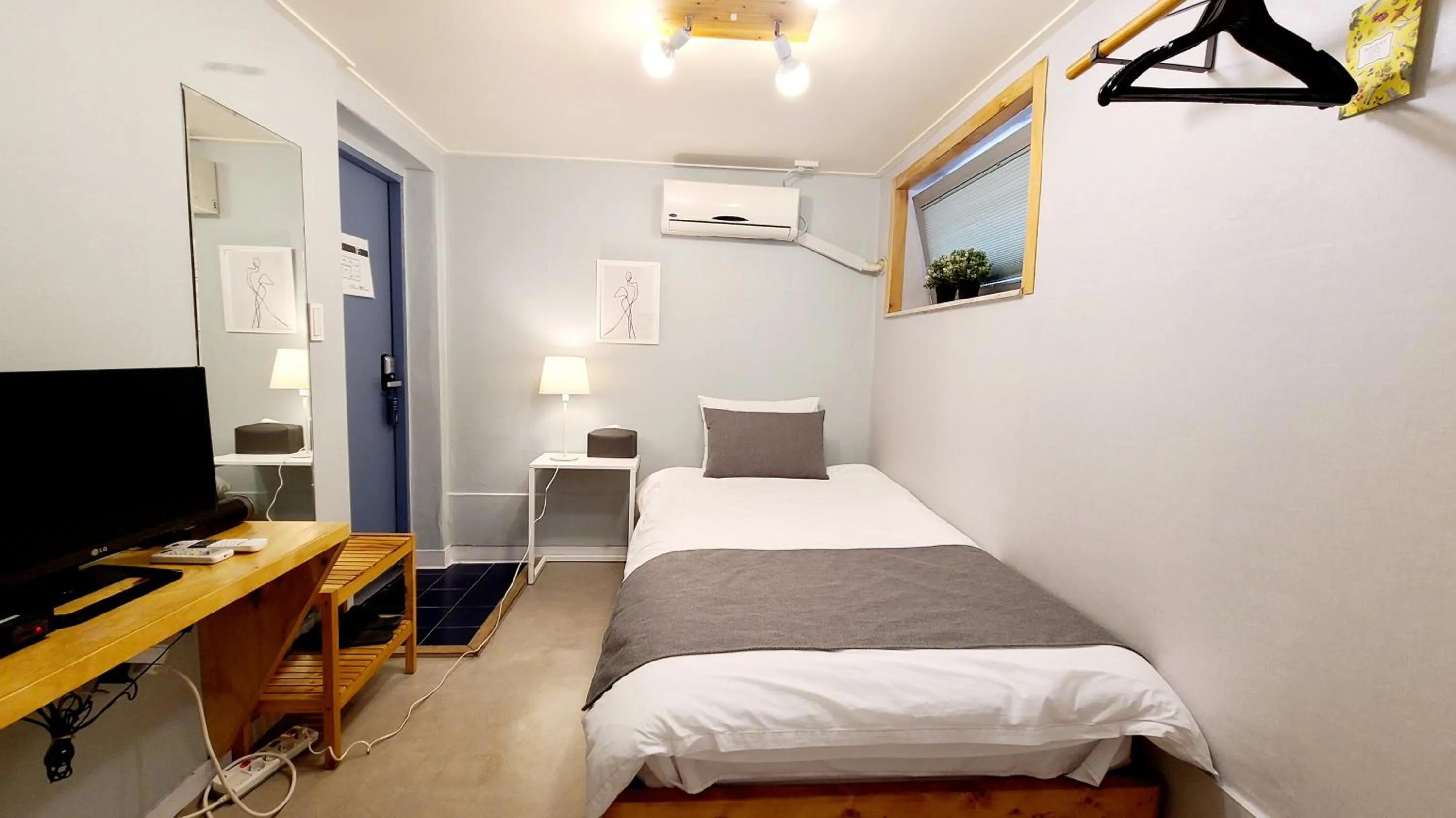 Bed in DW Design Residence