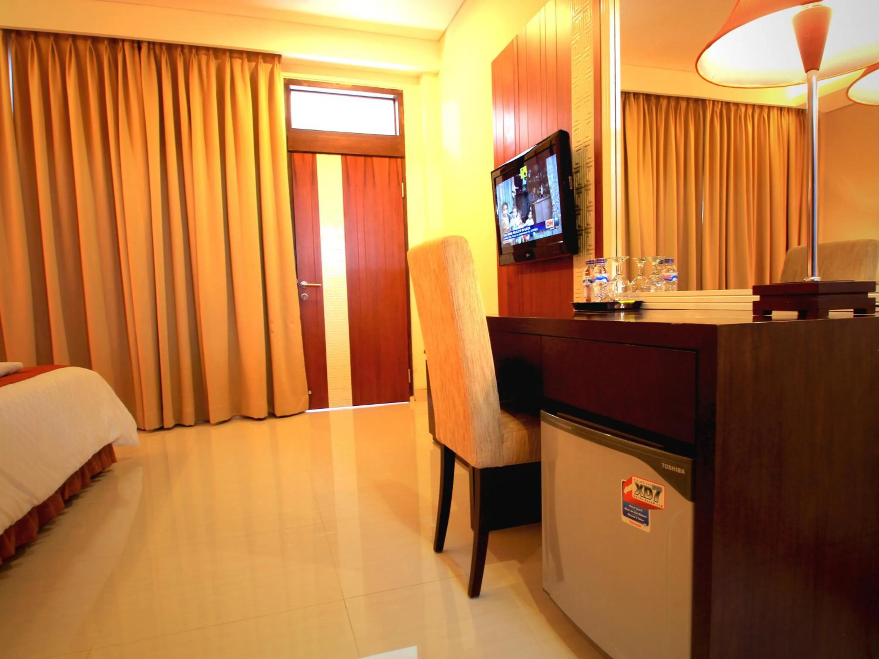 Seating area, Bed in Jesens Inn II