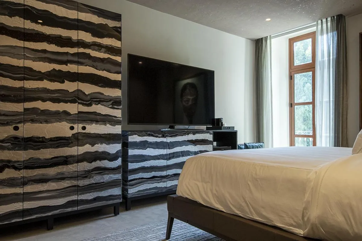 Bed in L Hotel Perla Boutique