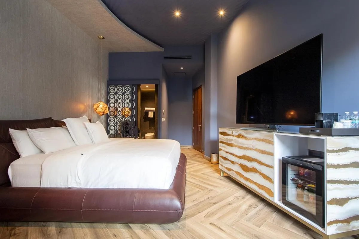 Bed in L Hotel Perla Boutique