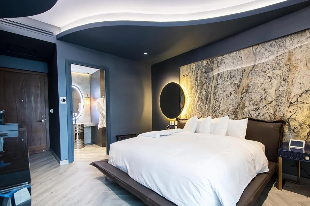 Bed in L Hotel Perla Boutique