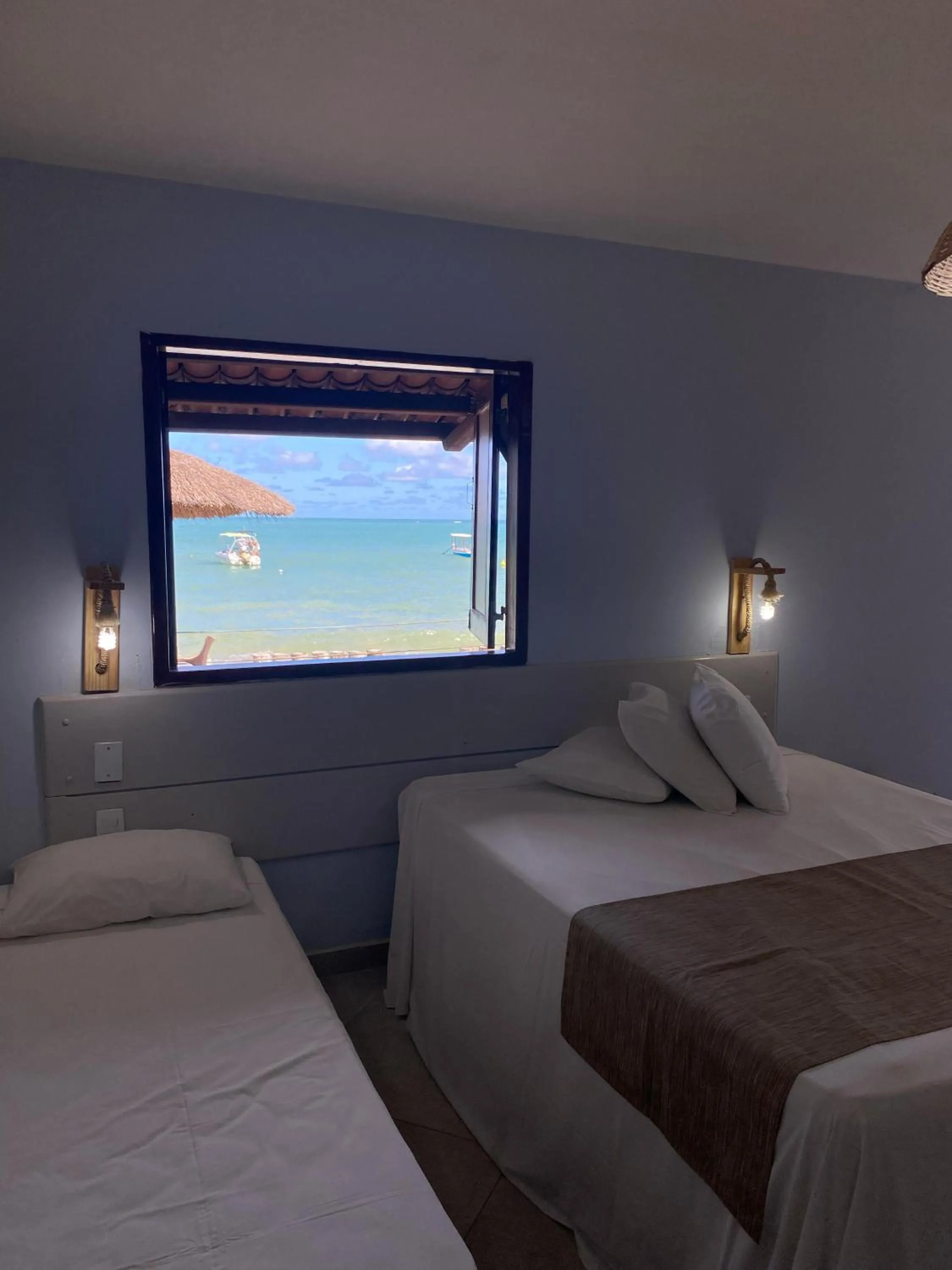 View (from property/room), Bed in Pousada Vivenda Oriente