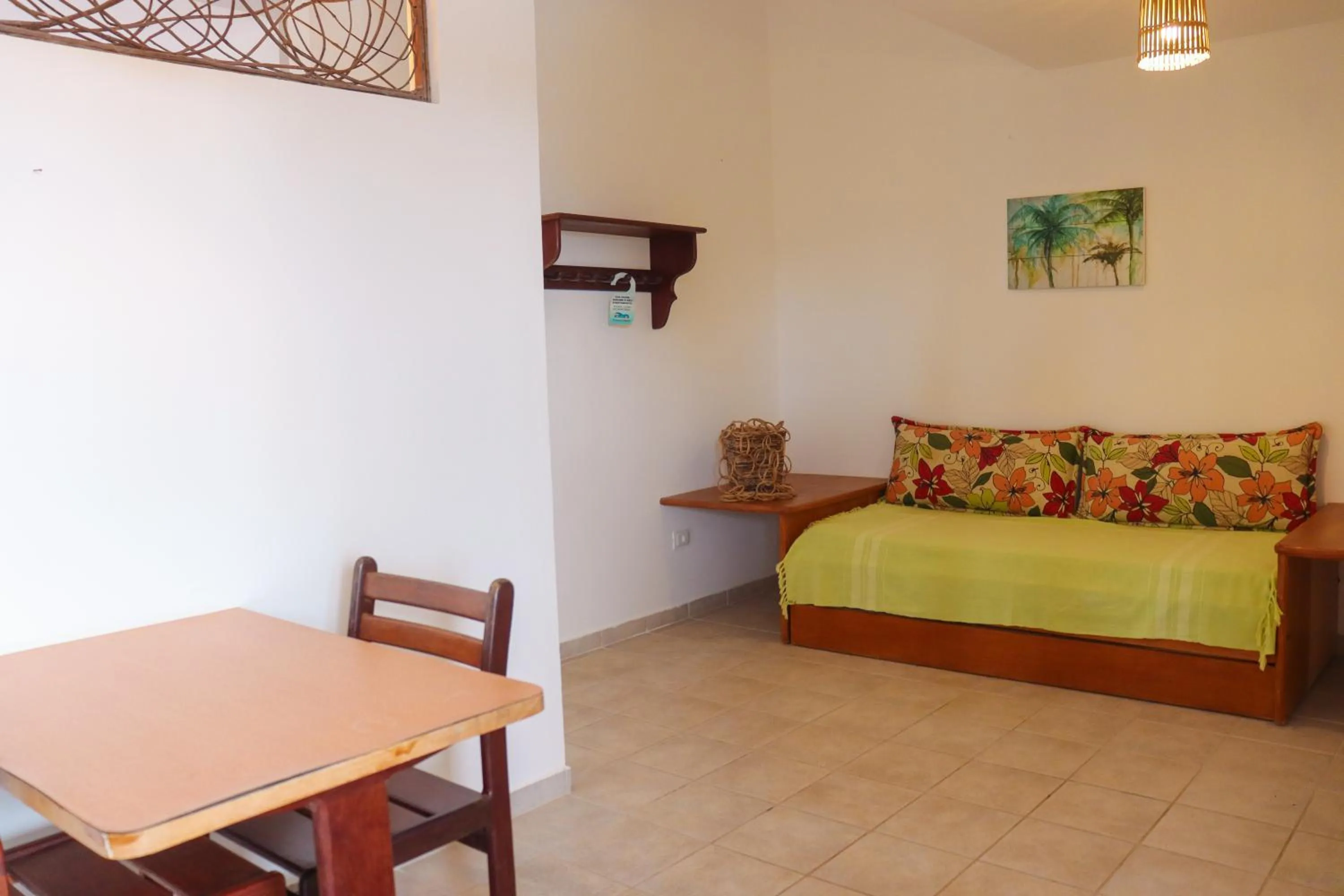 Living room, Bed in Pousada Vivenda Oriente