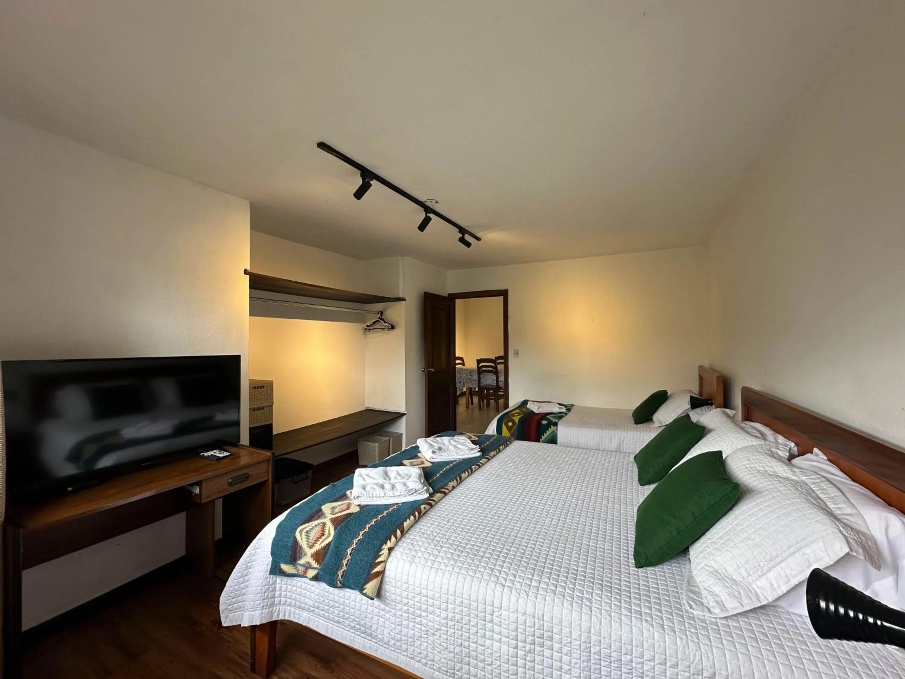 TV and multimedia, Bed in Apartamentos Otorongo Cuenca Ecuador