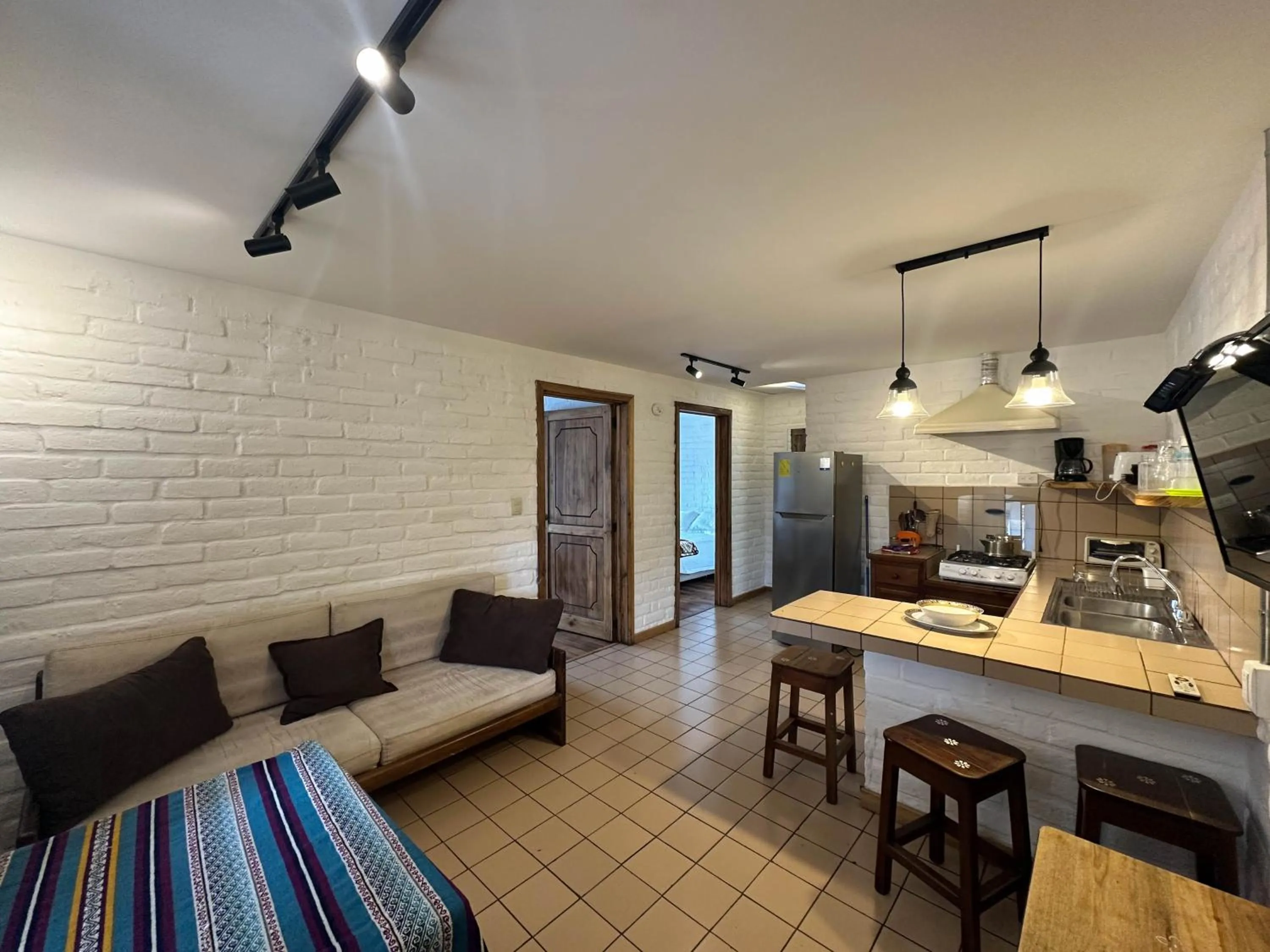 Kitchen or kitchenette in Apartamentos Otorongo Cuenca Ecuador